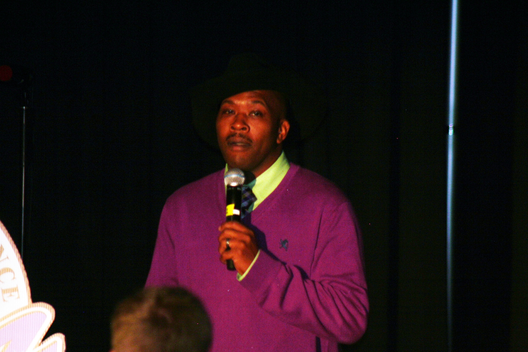 Tech. Sgt. Walter Campbell, from Joint Base McGuire-Dix-Lakehurst, N.J., works as the master of ceremonies, or emcee, during the 2011 Air Mobility Command Icon finals Oct. 20, 2011, at Scott Air Force Base, Ill. It was the third year Campbell brought his comedic routine to the Icon finals at Scott AFB. (U.S. Air Force Photo/Master Sgt. Scott T. Sturkol)