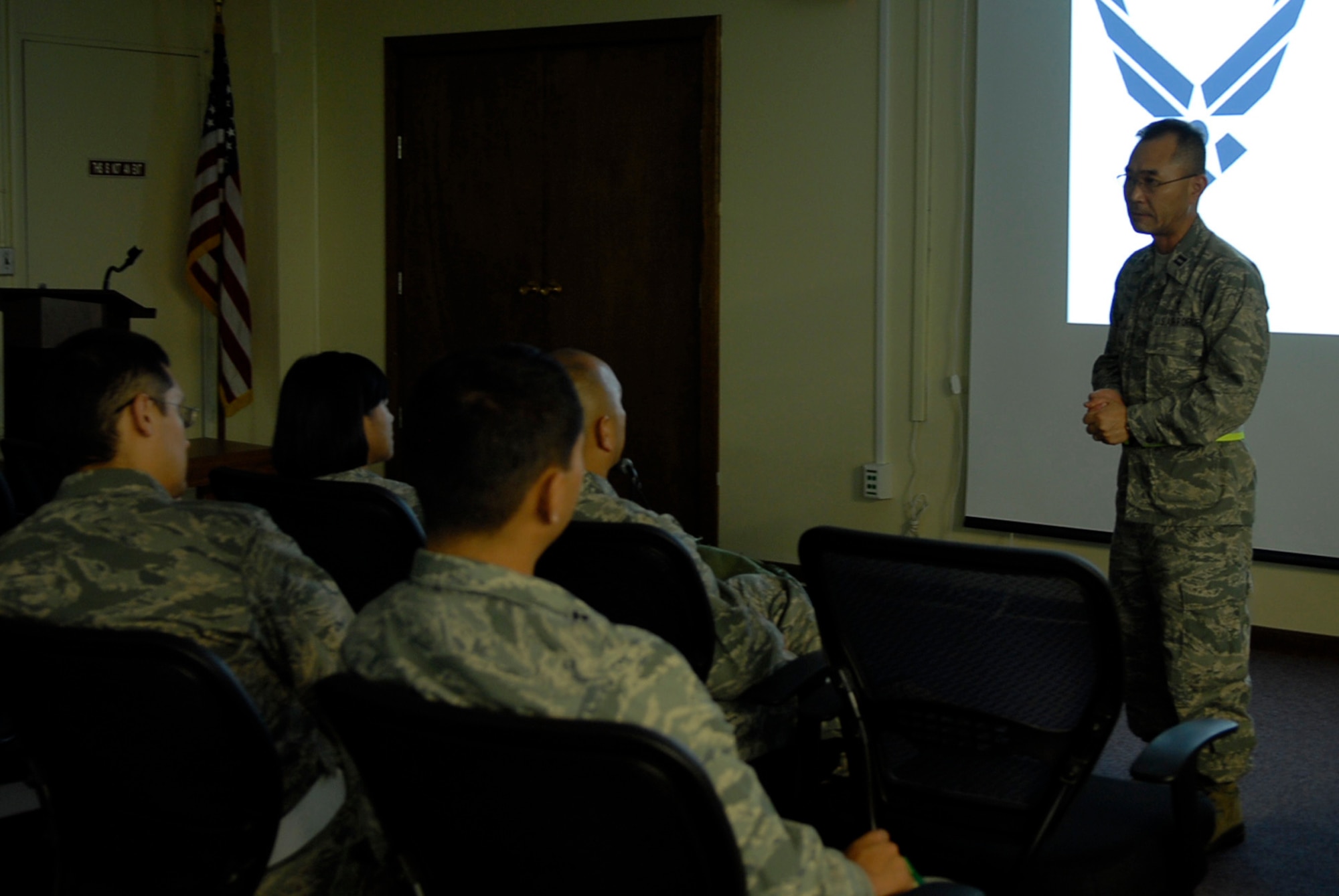 Chaplain (Capt.) Daniel Kim, 18th Wing chaplain, briefs simulated pre-deployers about the assistance chaplains offer while deployed during local operational readiness exercise Beverly High 12-1 at Kadena Air Base, Japan, Oct. 25. Chaplains play an important role to those deployed, offering not only a religious hand, but also someone to confide in. (U.S. Air Force photo/ Airman 1st Class Tara A. Williamson/ released)