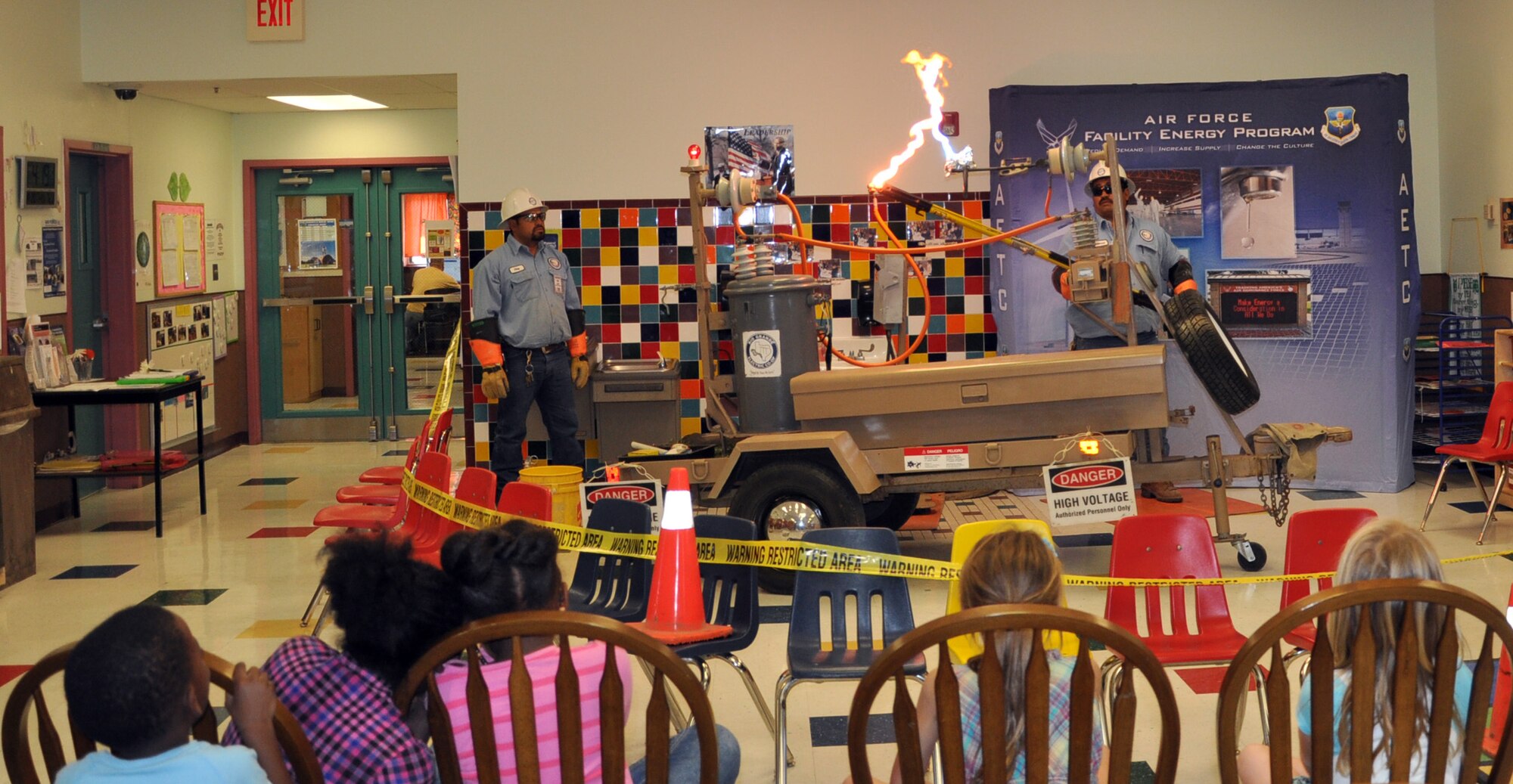 LAUGHLIN AIR FORCE BASE, TEXAS— Representatives from Rio Grande Electric Cooperative demonstrate the dangers of electricity to children at the Youth Center classroom Oct. 20. The demonstration was part of Air Force Energy Awareness Month, which promotes energy conservation and safety. (U.S. Air Force photo/2nd Lt. James Ramirez)