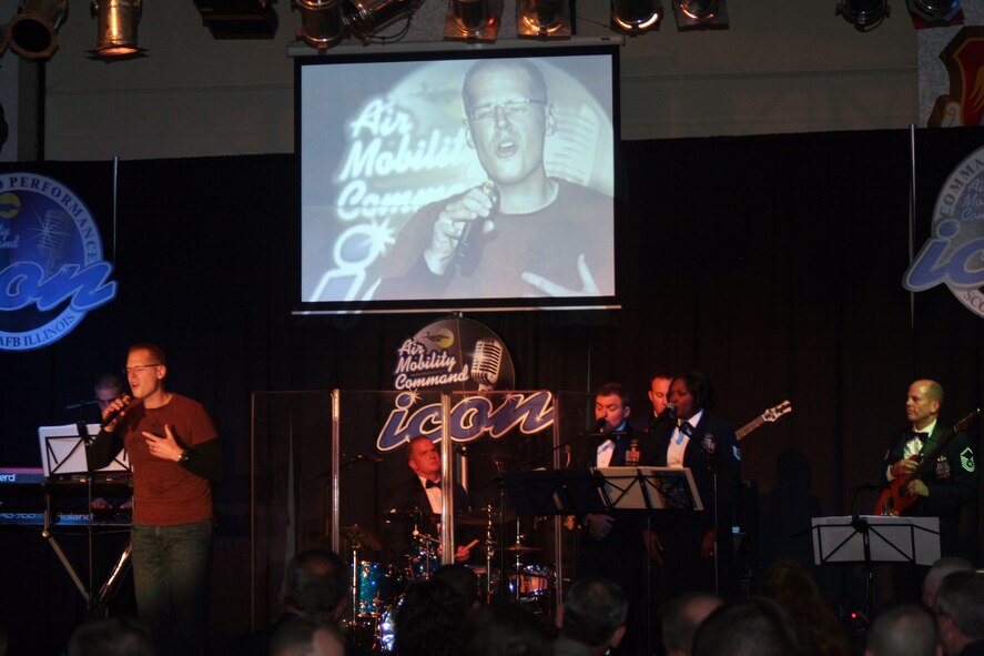 First Lt. Jonathan Lanning sings "Desperado" during the Air Mobility Command Icon finals competition Oct. 20, 2011, at Scott Air Force Base, Ill. Lanning made it to the finals by winning the base level competition at McConnell AFB. Icon is an AMC commander's initiative to showcase the vocal talents of AMC Airmen. Each AMC base holds Icon contests in July and August to determine their representatives for the command final which takes place at Scott AFB. (U.S. Air Force Photo/Master Sgt. Scott T. Sturkol)