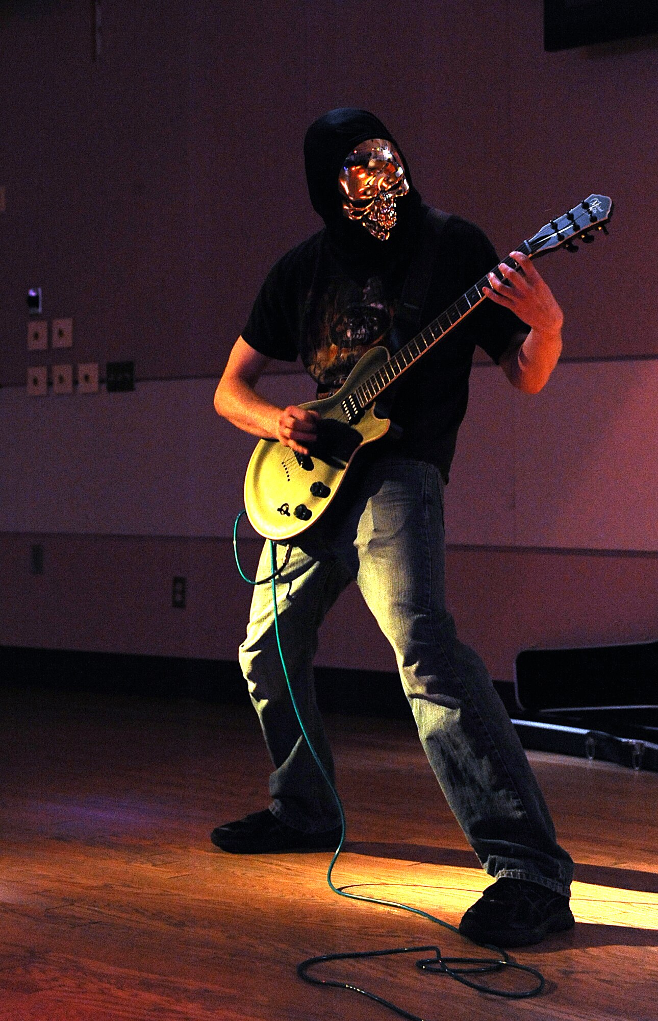 GOODFELLOW AIR FORCE BASE, Texas—Army PfC. Matthew Martorella, 344th Military Intelligence Battalion student, plays his guitar for the Boo Bash talent and costume contest at the Event Center  Oct. 21. Martorella won first place for the talent contest. (U.S. Air Force photo/Airman 1st Class Michael Smith)