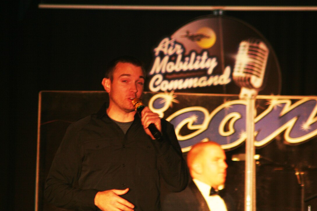 Staff Sgt. Clint Yager sings "Just The Way You Are" during the Air Mobility Command Icon finals competition Oct. 20, 2011, at Scott Air Force Base, Ill. Yager, from the 19th Component Maintenance Squadron at Little Rock Air Force Base, Fla., made it to the finals by winning the base level competition at Little Rock AFB. Icon is an AMC commander's initiative to showcase the vocal talents of AMC Airmen. Each AMC base holds Icon contests in July and August to determine their representatives for the command final which takes place at Scott AFB. (U.S. Air Force Photo/Master Sgt. Scott T. Sturkol)