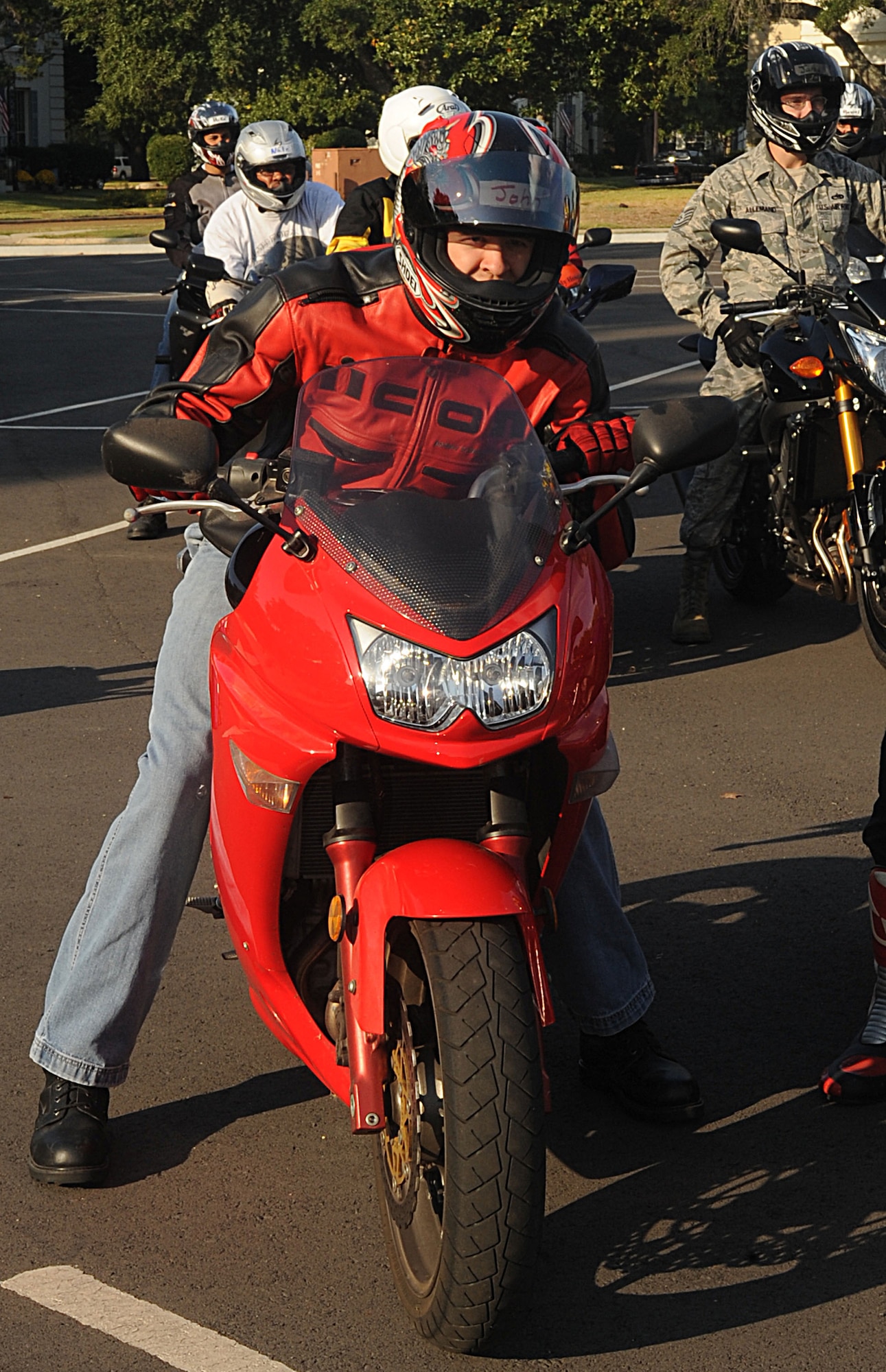 Tech. Sgt. John Robertson, 49th Test and Evaluation Squadron, practices leaning with his bike during a military sport bike rider course on Barksdale Air Force Base, La., Oct. 22. Leaning on a motorcycle helps to control the bike while turning. Personnel who own a sport bike are required to take the eight-hour military sport bike rider course or the advance rider course to help further their skills on the bike. (U.S. Air Force photo/Senior Airman Kristin High)(RELEASED) 