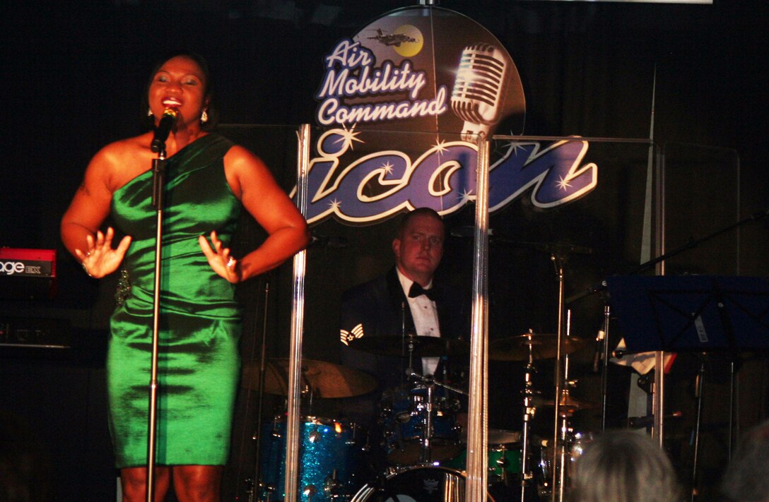 Tech. Sgt. Chastity Sullivan sings "I Believe in You and Me" during the Air Mobility Command Icon finals competition Oct. 20, 2011, at Scott Air Force Base, Ill. Sullivan, from the Joint Communications Support Element at MacDill Air Force Base, Fla., was participating in her first Icon competition. The Valdosta, Ga., native made it to the finals by winning the base level competition at MacDill AFB. Icon is an AMC commander's initiative to showcase the vocal talents of AMC Airmen. Each AMC base holds Icon contests in July and August to determine their representatives for the command final which takes place at Scott AFB. (U.S. Air Force Photo/Master Sgt. Scott T. Sturkol)
