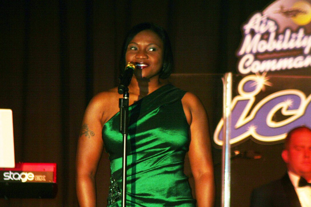 Tech. Sgt. Chastity Sullivan sings "I Believe in You and Me" during the Air Mobility Command Icon finals competition Oct. 20, 2011, at Scott Air Force Base, Ill. Sullivan, from the Joint Communications Support Element at MacDill Air Force Base, Fla., was participating in her first Icon competition. The Valdosta, Ga., native made it to the finals by winning the base level competition at MacDill AFB. Icon is an AMC commander's initiative to showcase the vocal talents of AMC Airmen. Each AMC base holds Icon contests in July and August to determine their representatives for the command final which takes place at Scott AFB. (U.S. Air Force Photo/Master Sgt. Scott T. Sturkol)