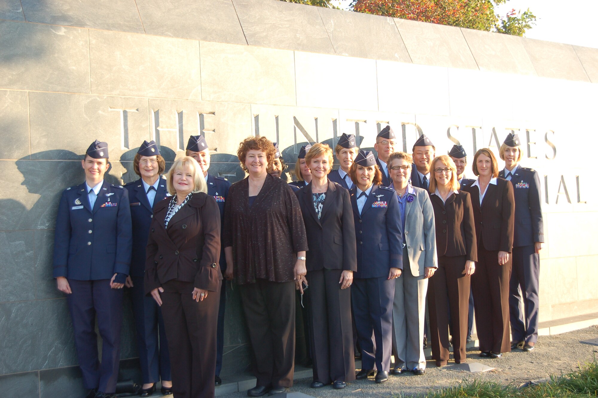 Maj. Gen. Kimberley Siniscalchi, Assistant Surgeon General, and attendees of
the Air Force Nurse Transition Program conference gather for an early
morning group photo at the Air Force Memorial, Oct 7, 2011.  (Air Force Photo)
