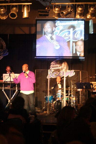 Tech. Sgt. Walter Campbell, from Joint Base McGuire-Dix-Lakehurst, N.J., works as the master of ceremonies, or emcee, during the 2011 Air Mobility Command Icon finals Oct. 20, 2011, at Scott Air Force Base, Ill. It was the third year Campbell brought his comedic routine to the Icon finals at Scott AFB. (U.S. Air Force Photo/Master Sgt. Scott T. Sturkol)