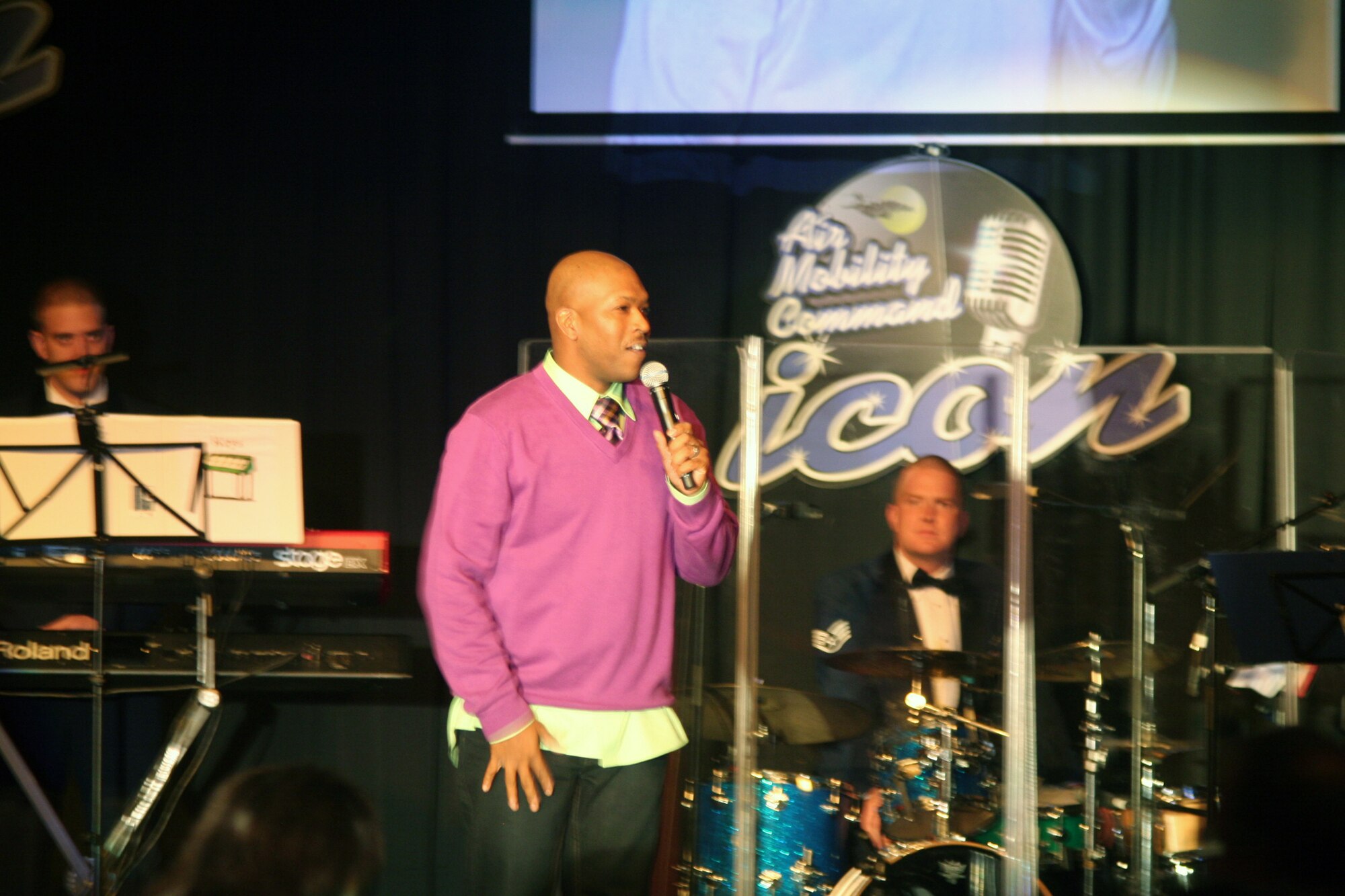 Tech. Sgt. Walter Campbell, from Joint Base McGuire-Dix-Lakehurst, N.J., works as the master of ceremonies, or emcee, during the 2011 Air Mobility Command Icon finals Oct. 20, 2011, at Scott Air Force Base, Ill. It was the third year Campbell brought his comedic routine to the Icon finals at Scott AFB. (U.S. Air Force Photo/Master Sgt. Scott T. Sturkol)