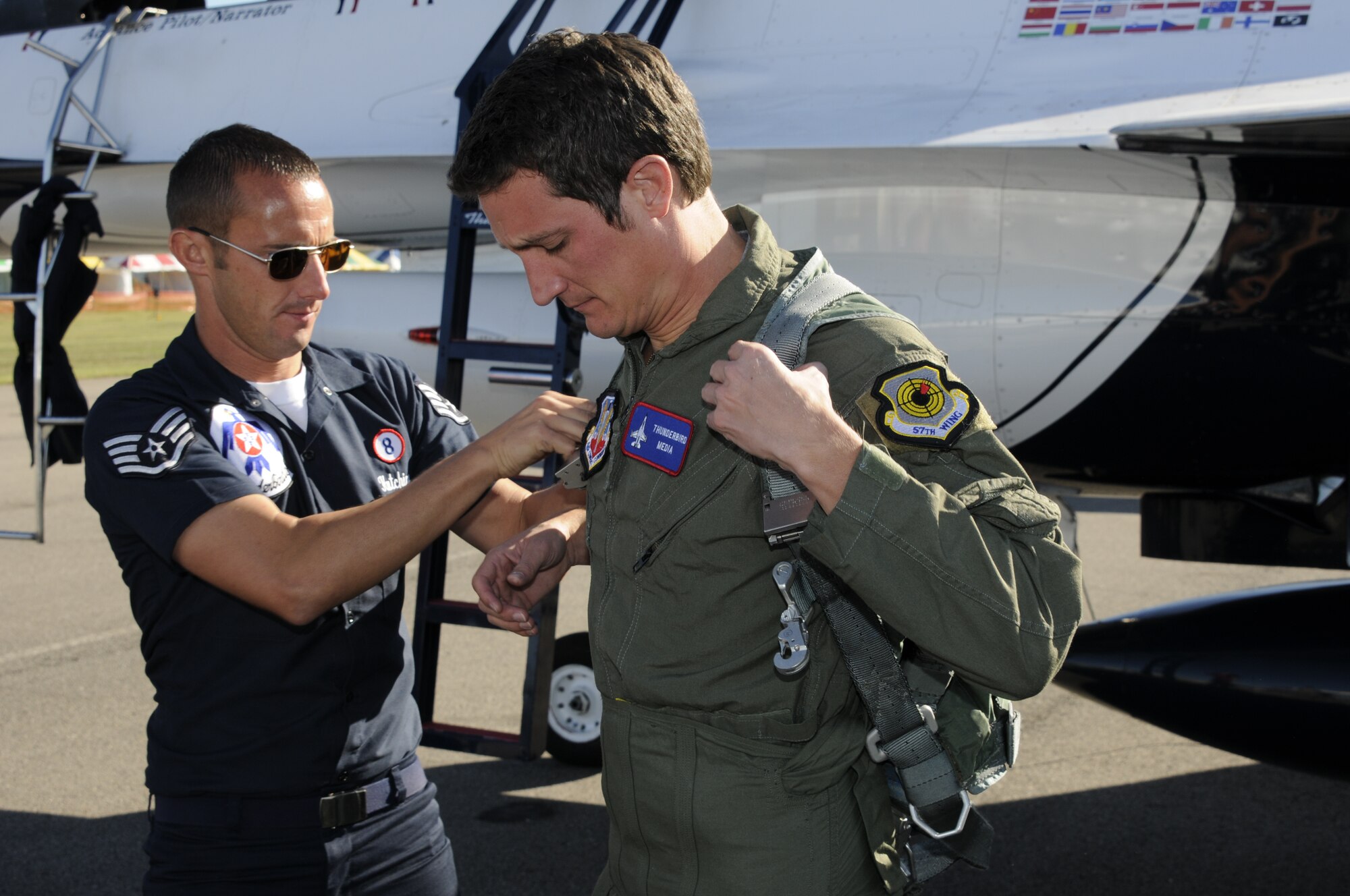 Meteorologist Drew Michaels of local ABC affiliate KHBS/KHOG 40/29 received an orientation ride in a U.S. Air Force Thunderbird F-16D Falcon Sept. 30 during the Fort Smith Air Show, which was attended by a record 255,000 spectators. Capt. Kristin Hubbard, Thunderbird advance pilot and narrator, was Michaels’ pilot. Michaels received a “9G” pin and a framed and autographed lithograph. Michaels pulled 9Gs three times during the flight, which lasted about one hour. (U.S. Air Force photo by Senior Master Sgt. Dennis Brambl/188th Fighter Wing Public Affairs)