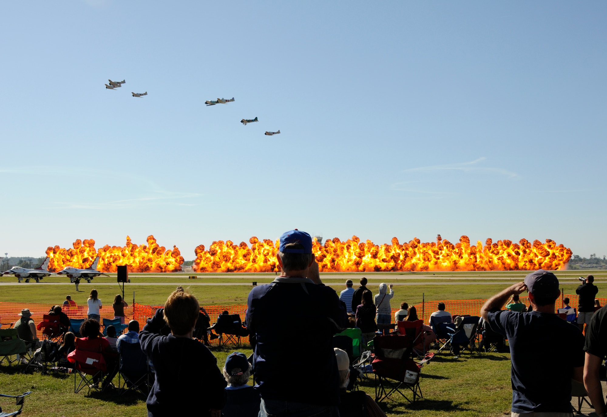 Tora! Tora! Tora! performs its reenactment of the Dec. 7, 1941 attack on Pearl Harbor at the Fort Smith Air Show Oct. 1. The show drew a record 255,000 spectators. (U.S. Air Force photo by Senior Master Sgt. Dennis Brambl/188th Fighter Wing Public Affairs)