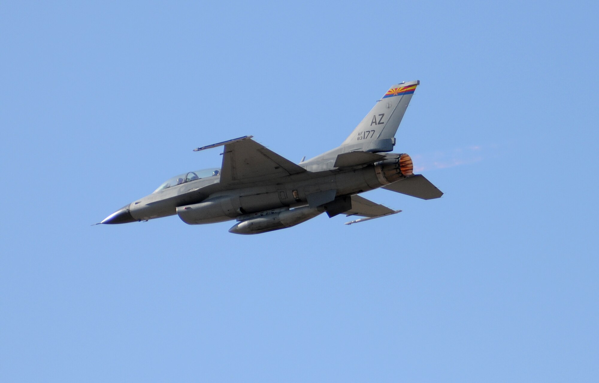 Maj. John Smith and RAF Flight Lt. Kirsty Stewart take off from Tucson International Airport in full afterburner Oct. 21. (U.S. Air Force photo/Maj. Gabe Johnson)