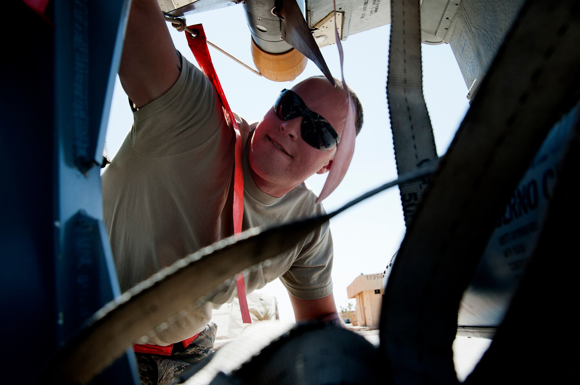 Tech. Sgt. Jeremiah Johnson, a crew chief from the 125th Expeditionary Fighter Squadron, loads missiles onto an F-16 Fighting Falcon minutes after it arrived in Iraq Oct. 1, 2011. The squadron deployed in support of Operation New Dawn and will provide close air support for more than 40,000 troops leaving Iraq by the end of the year. The 125th EFS is comprised of F-16s, pilots, maintenance specialists and support personnel from the Oklahoma Air National Guard’s 138th Fighter Wing in Tulsa, Okla. The squadron also includes members from the Ohio Air National Guard’s 180th Fighter Wing in Toledo, Ohio, and the Arizona Air National Guard’s 162nd Fighter Wing in Tucson, Ariz.  (U.S. Air Force photo/Master Sgt. Cecilio Ricardo)