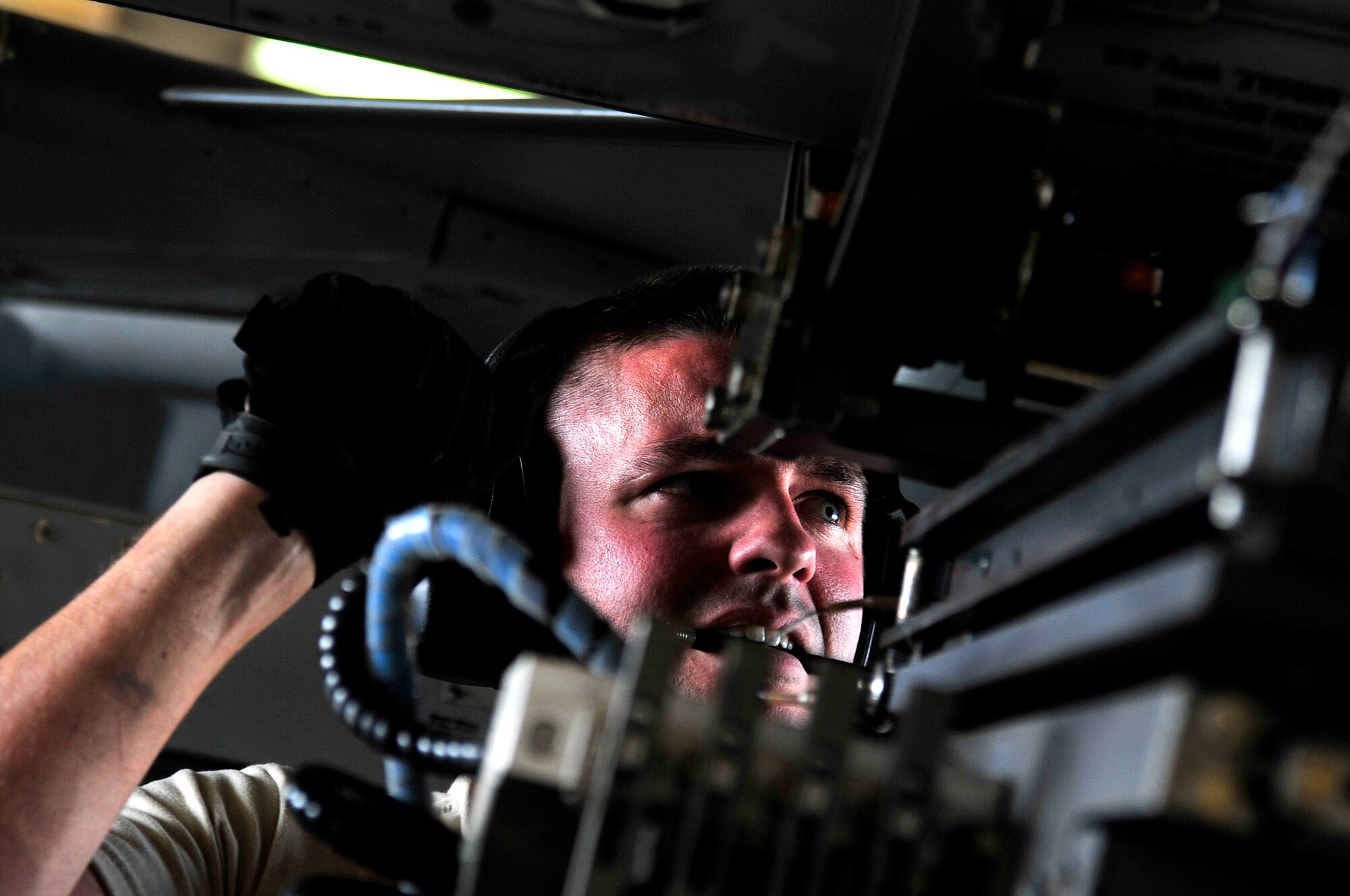 Tech. Sgt. Jeremiah Johnson, a crew chief from the 125th Expeditionary Fighter Squadron, loads missiles onto an F-16 Fighting Falcon minutes after it arrived in Iraq Oct. 1, 2011. The squadron deployed in support of Operation New Dawn and will provide close air support for more than 40,000 troops leaving Iraq by the end of the year. The 125th EFS is comprised of F-16s, pilots, maintenance specialists and support personnel from the Oklahoma Air National Guard’s 138th Fighter Wing in Tulsa, Okla. The squadron also includes members from the Ohio Air National Guard’s 180th Fighter Wing in Toledo, Ohio, and the Arizona Air National Guard’s 162nd Fighter Wing in Tucson, Ariz. (U.S. Air Force photo/Master Sgt. Cecilio Ricardo)