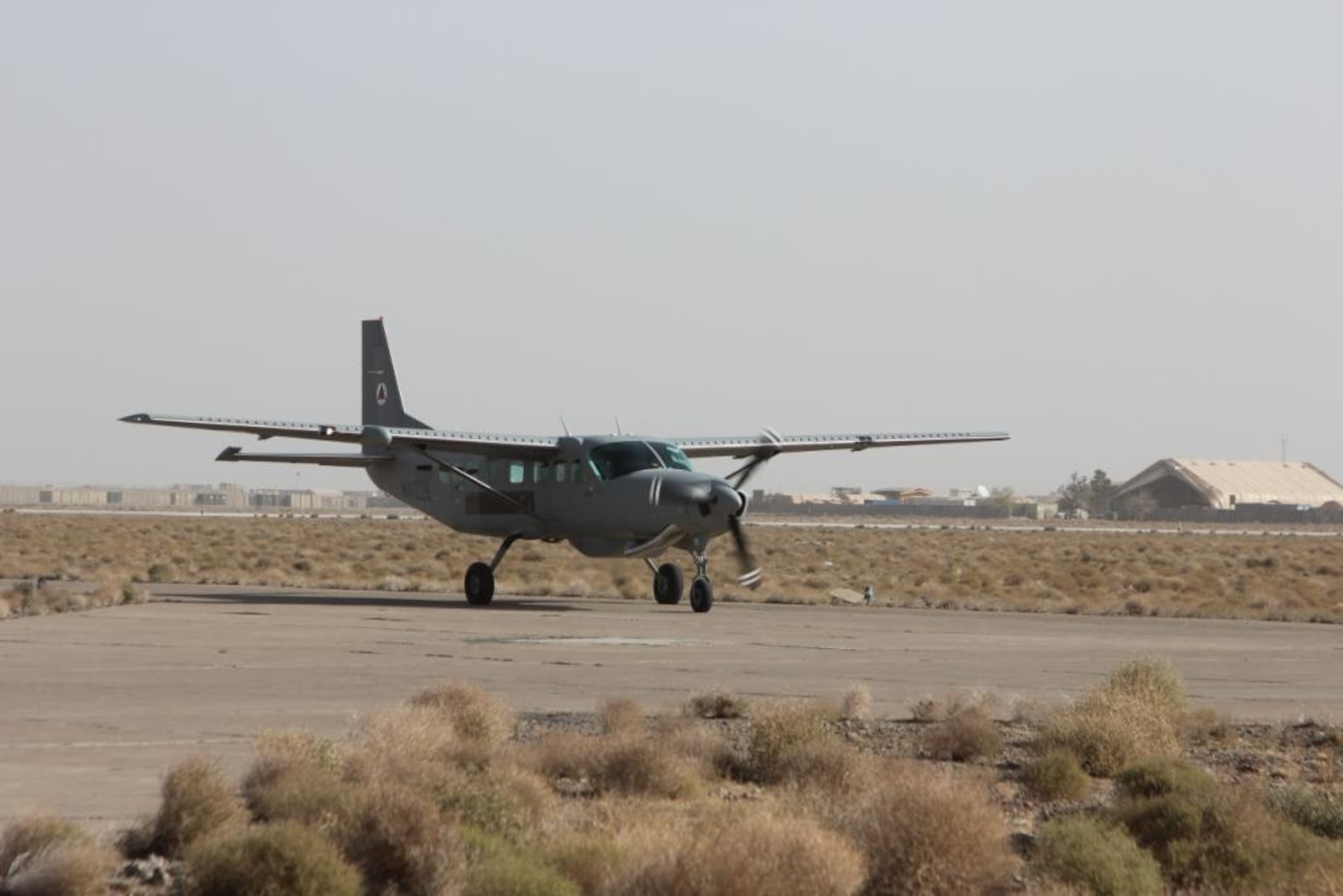 One of three new Cessna 208Bs taxies to its parking pad after landing at Shindand Air Base, October 22. According to Shindand officials, the C-208B’s will be used as the advanced trainers for Afghan undergraduate pilot training, initial qualification and upgrade training as well as operational light airlift. (ISAF photo by Sargento OR-6 Juan Ardura Santa Engracia, Spanish Army, Regional Command West)