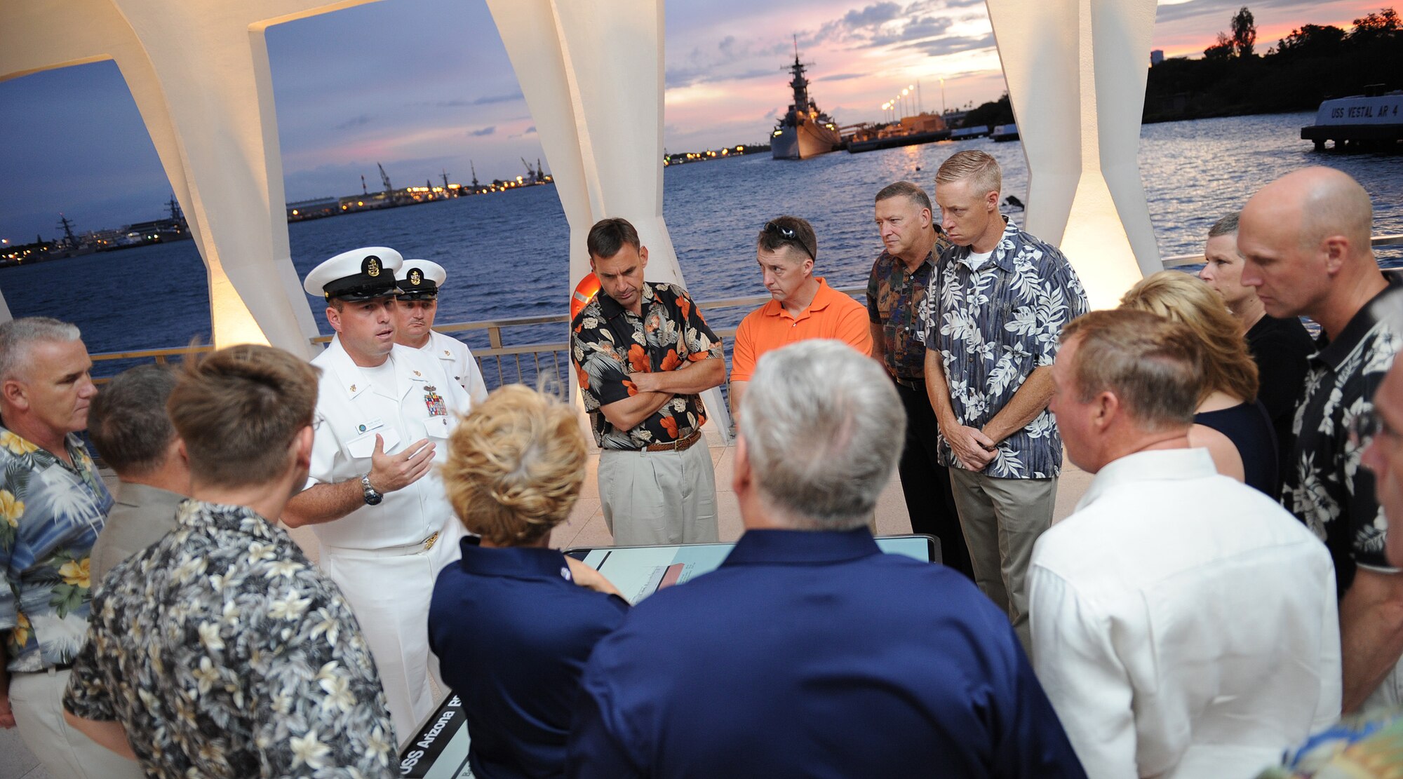 Senior Chief Frank W. Pagan, Pacific Fleet Boathouse officer in charge, gives a narrated, guided tour of the USS Arizona Memorial to Pacific Air Forces senior leaders near Ford Island, Hawaii, Oct. 7.  The group attended a special event for the Fall Commanders and Command Chiefs Warfighter Conference in which this year’s theme paid homage to military heritage.  The conference, which took place Oct. 5-7, was designed to expand and enhance the relationship between uniformed servicemembers in the Pacific region, and to develop the growing relationships with civilian partners.  (U.S. Air Force photo/Tech. Sgt. Jerome S. Tayborn)