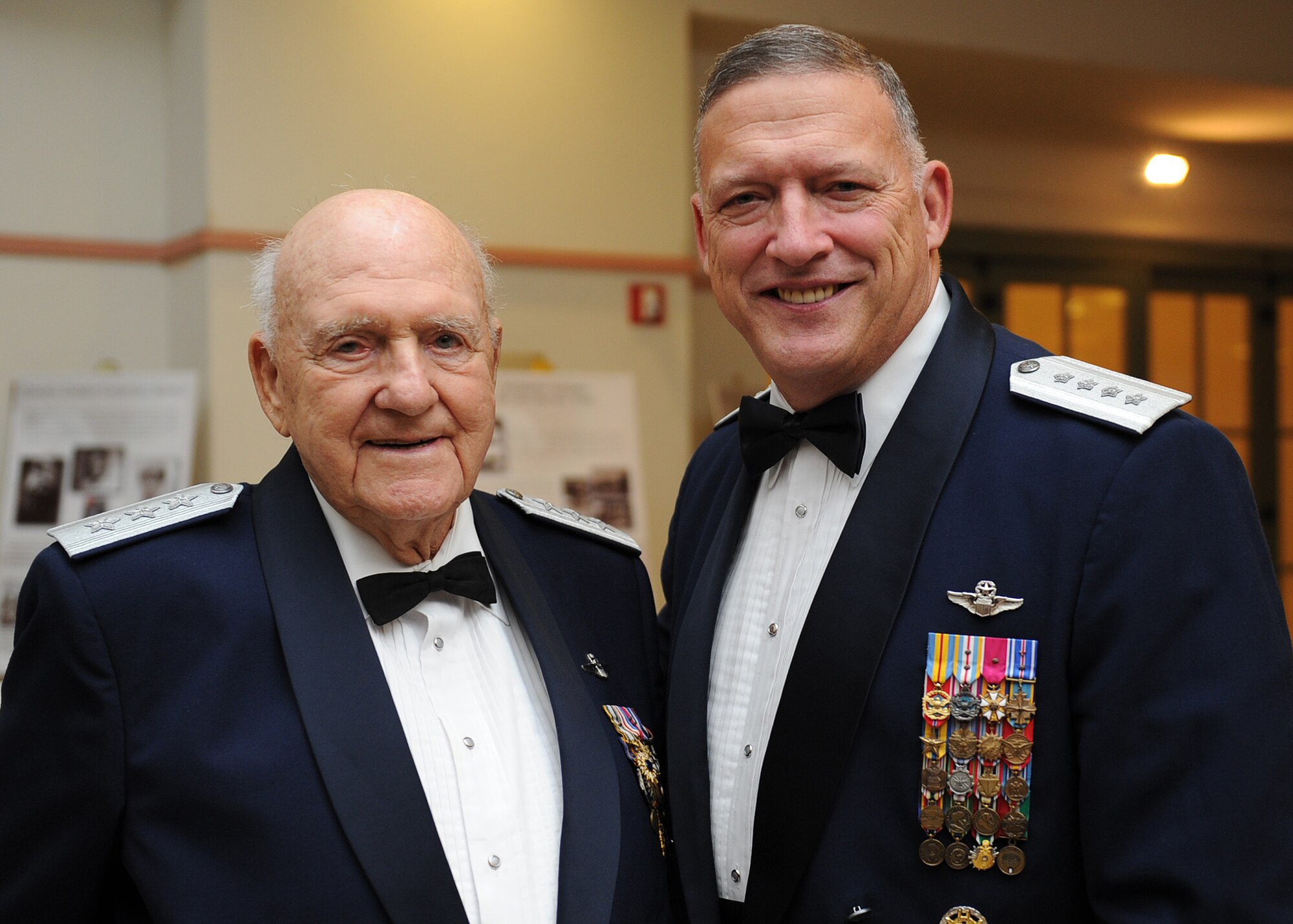 Lt. Gen. (ret.) Winton “Bones” Marshall, Korean War Ace and Vice Commander in Chief for Pacific Air Forces from 1974-1975, smiles for a photo with Pacific Air Forces Commander Gen. Gary North at the Nehelani Banquet and Conference Facility, Schofield Barracks, Hawaii, Oct. 6.  General Marshall and his wife were special guests for the Fall Commanders and Command Chiefs Warfighter Conference dinner, where this year’s theme paid homage to military heritage.  (U.S. Air Force photo/Tech. Sgt. Jerome S. Tayborn)   
