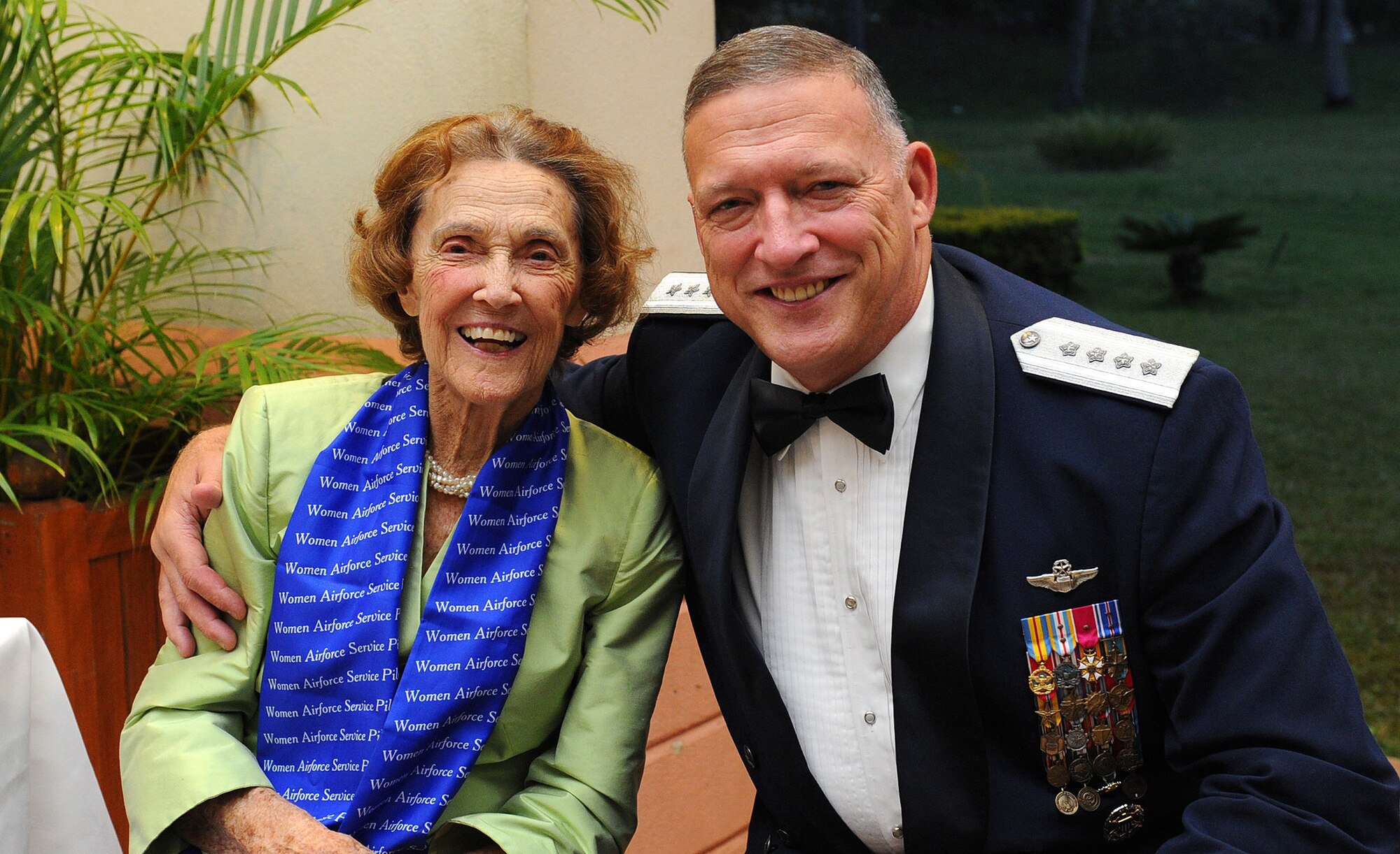 Mrs. Mildred Taylor Marshall, an original Women Airforce Service Pilots member, and Pacific Air Forces Commander Gen. Gary North smile for a photo at the Nehelani Banquet and Conference Facility, Schofield Barracks, Hawaii, Oct. 6.  Mrs. Marshall was a special guest for the Fall Commanders and Command Chiefs Warfighter Conference dinner, where this year’s theme paid homage to military heritage. (U.S. Air Force photo/Tech. Sgt. Jerome S. Tayborn)