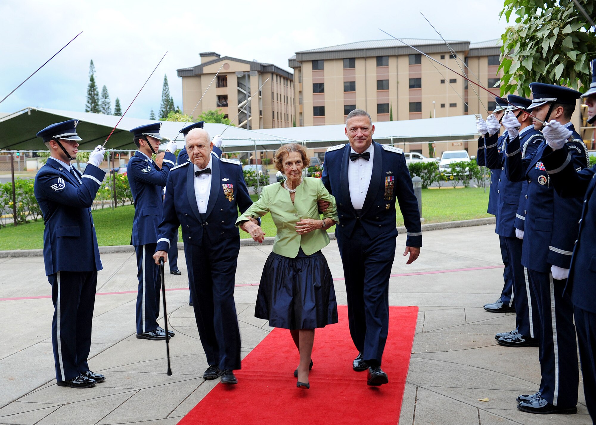 Lt. Gen. (ret.) Winton “Bones” Marshall, Korean War Ace and former Vice Commander in Chief for Pacific Air Forces from 1974-1975, and his wife Mildred Taylor Marshall, an original Women Airforce Service Pilots member, walk through the distinguish visitors honor guard cordon with Gen. Gary North, Pacific Air Forces commander, at the Nehelani Banquet and Conference Facility, Schofield Barracks, Hawaii, Oct. 6.  General Marshall and his wife were special guests for the Fall Commanders and Command Chiefs Warfighter Conference dinner, where this year’s theme paid homage to military heritage. (U.S. Air Force photo/Tech. Sgt. Jerome S. Tayborn)   