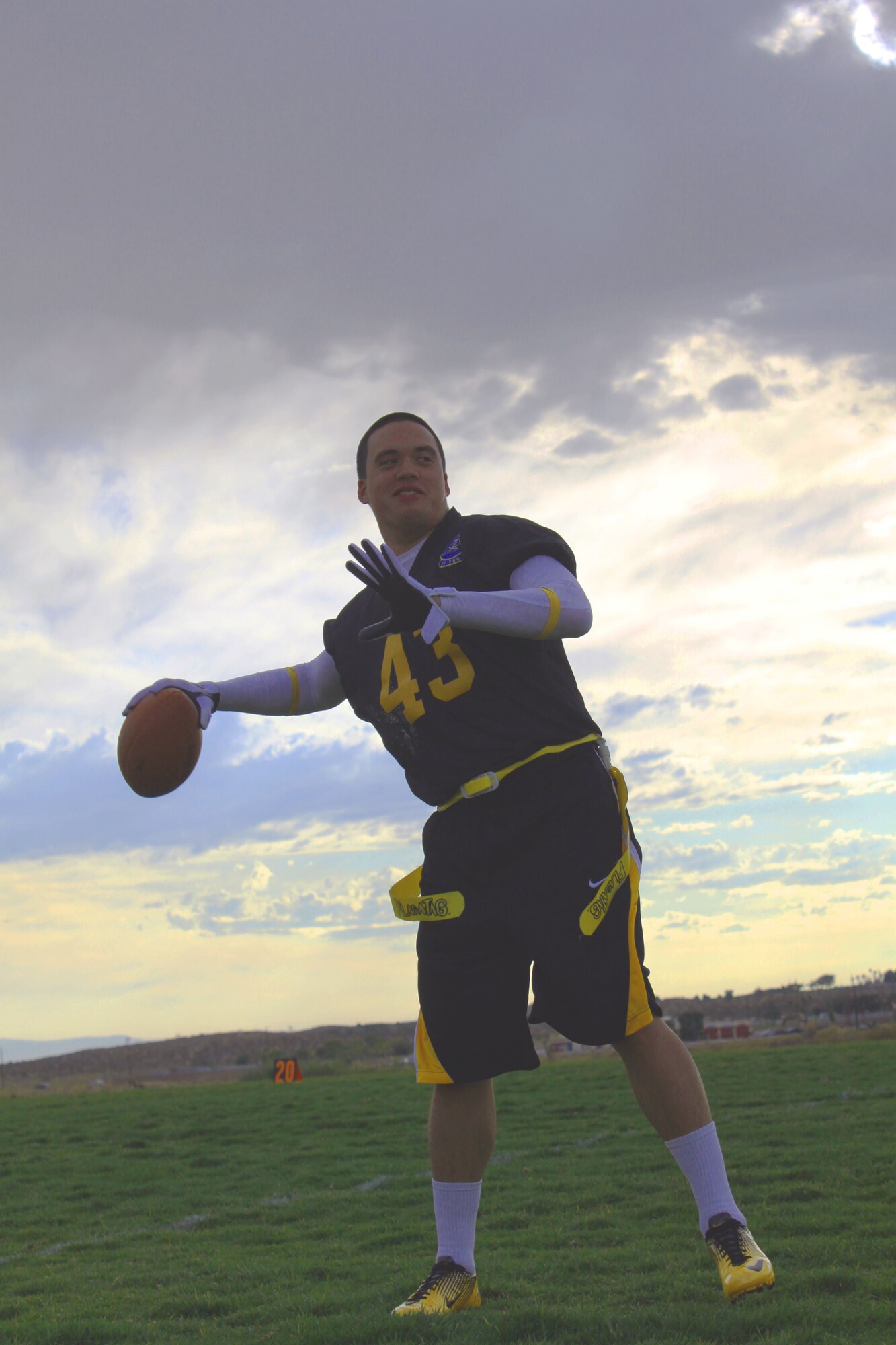 Staff Sgt. Joseph Masei, 31st Test and Evaluation Squadron, warms up before a football game at the Rosburg Fitness Center here Oct. 24. (U.S. Air Force Photo by Meredith Mingledorff)  