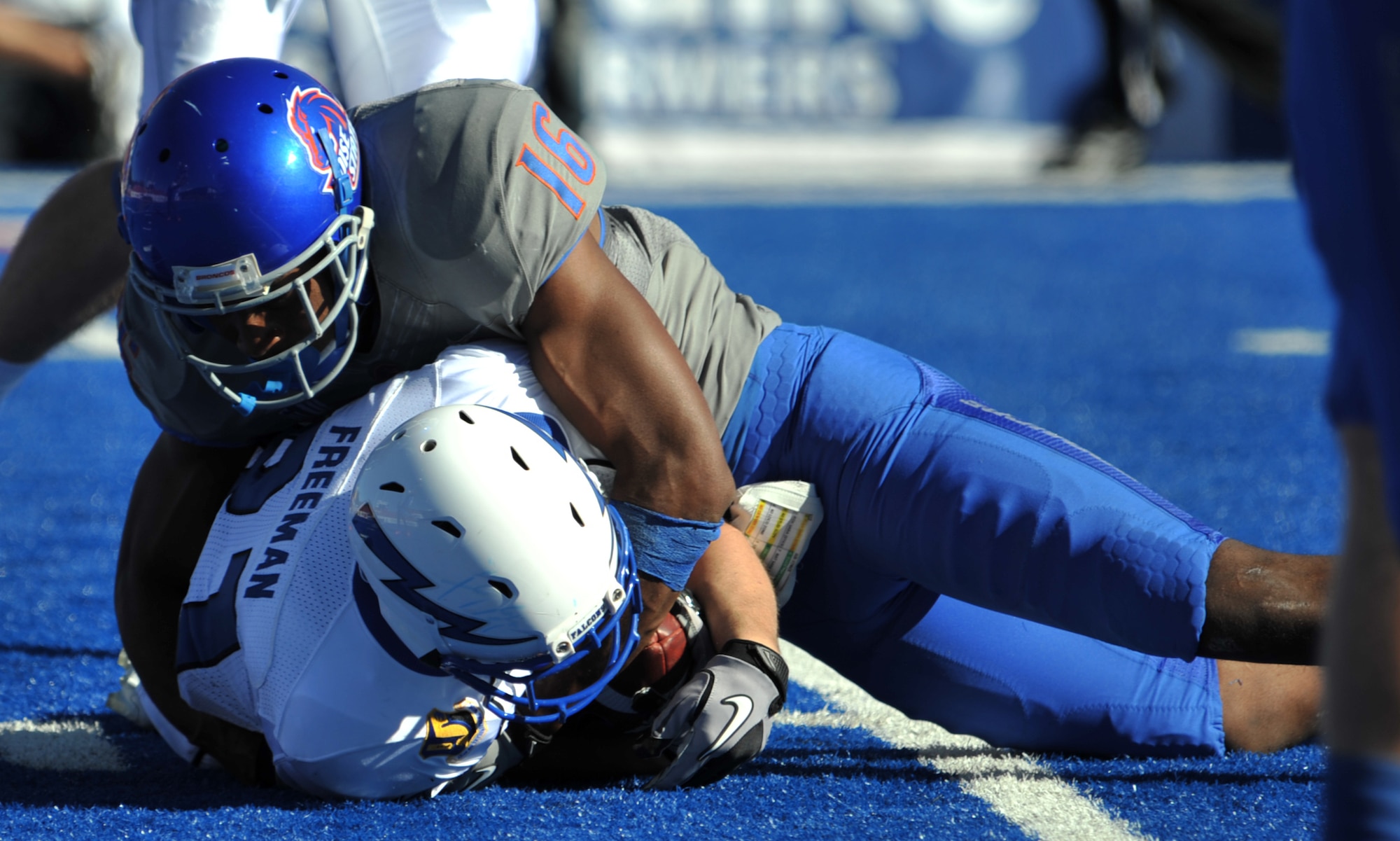 Boise State University Broncos safety Cedric Febis tackles Air Force Academy Falcons tight end Josh Freeman Oct. 22, 2011, at Bronco Stadium in Boise, Idaho. BSU won the game 37-26. (U.S. Air Force photo by Airman 1st Class Heather Hayward)