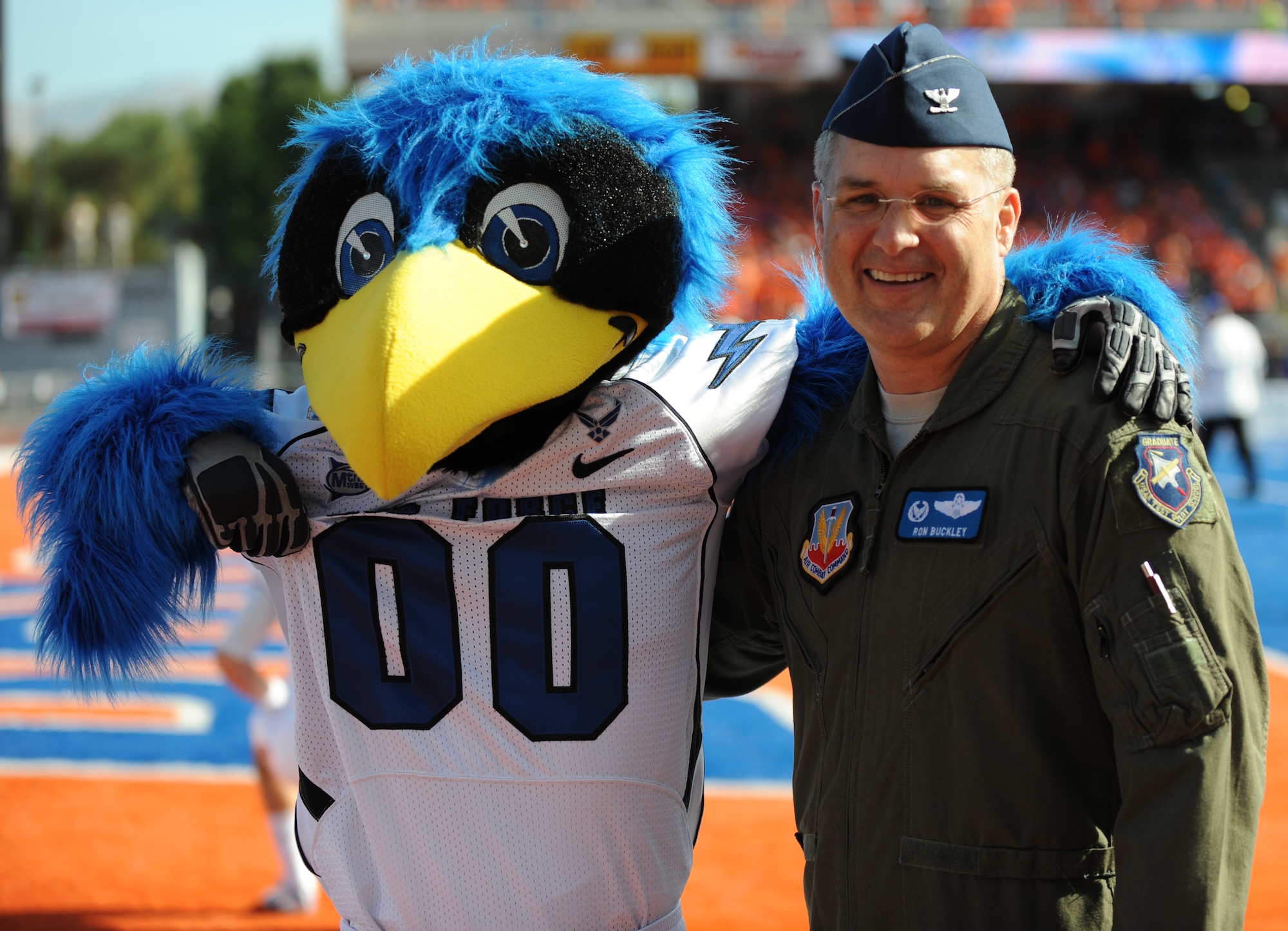 Col. Ron Buckley, 366th Fighter Wing commander, poses with the Air Force Academy mascot, “The Bird,” prior to the Falcon’s matchup with the Boise State Broncos Oct. 22, 2011. The 366th Fighter Wing’s 389th and 391st Fighter Squadrons provided a four-ship flyover of F-15E Strike Eagles for the game that proved to be victory number seven for the Broncos as they beat the Falcons 37-26 at Bronco Stadium in Boise, Idaho. (U.S. Air Force photo by 2nd Lt. David Liapis)