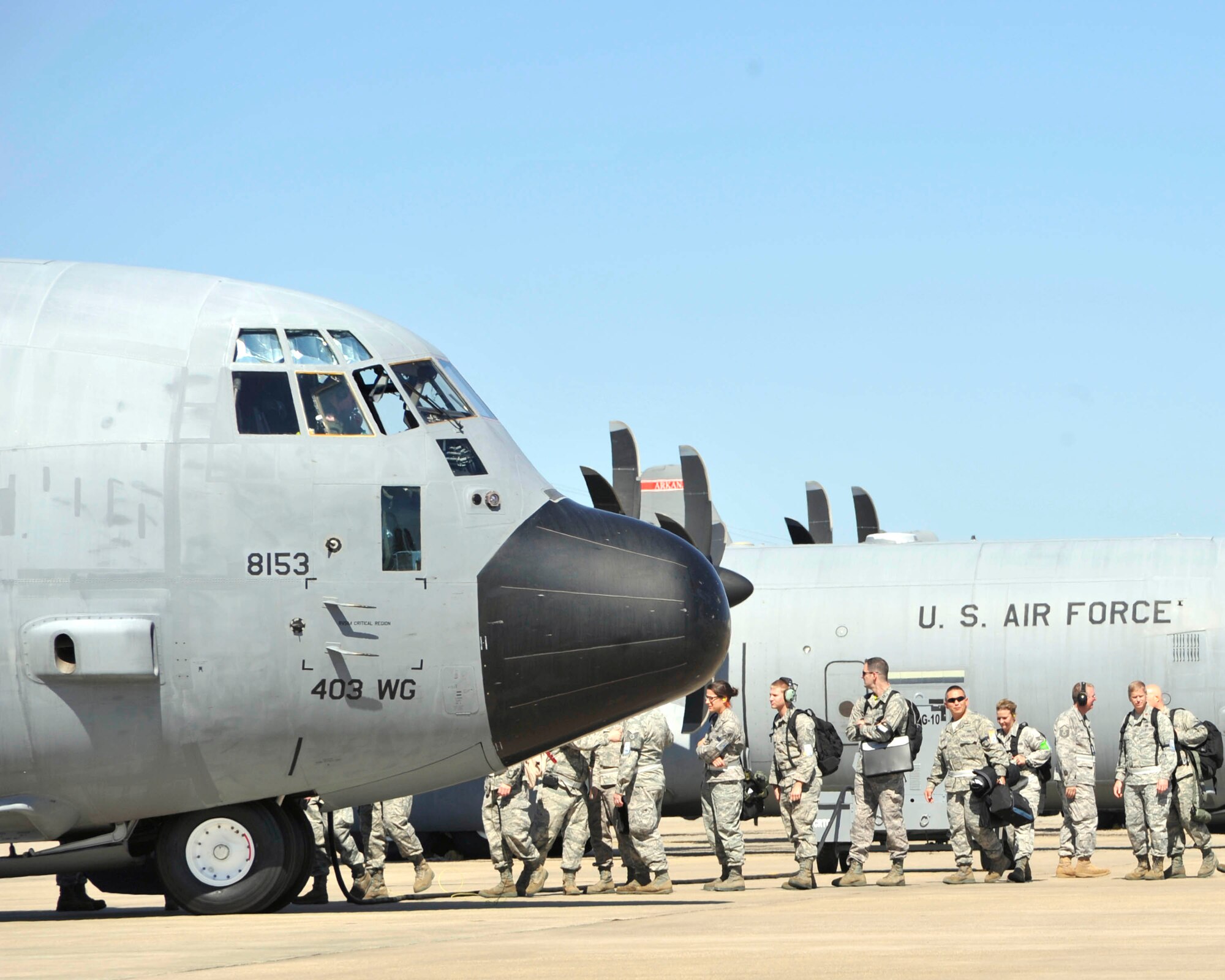 Reservists with the 403rd Wing board an 815th Airlift Squadron C-130J bound for Keesler AFB Oct. 21. The 403rd Wing, along with the 433rd Airlift Wing and 165th AW, participated in a five-day Operational Readiness Exercise held at the  Combined Readiness Training Center, Gulfport, Miss. The three-wing exercise tested airmen on various military scenarios and is the precursor to the Wings' Operational Readiness Inspection in early 2012. (U.S. Air Force photo by Maj. Heather Newcomb) 