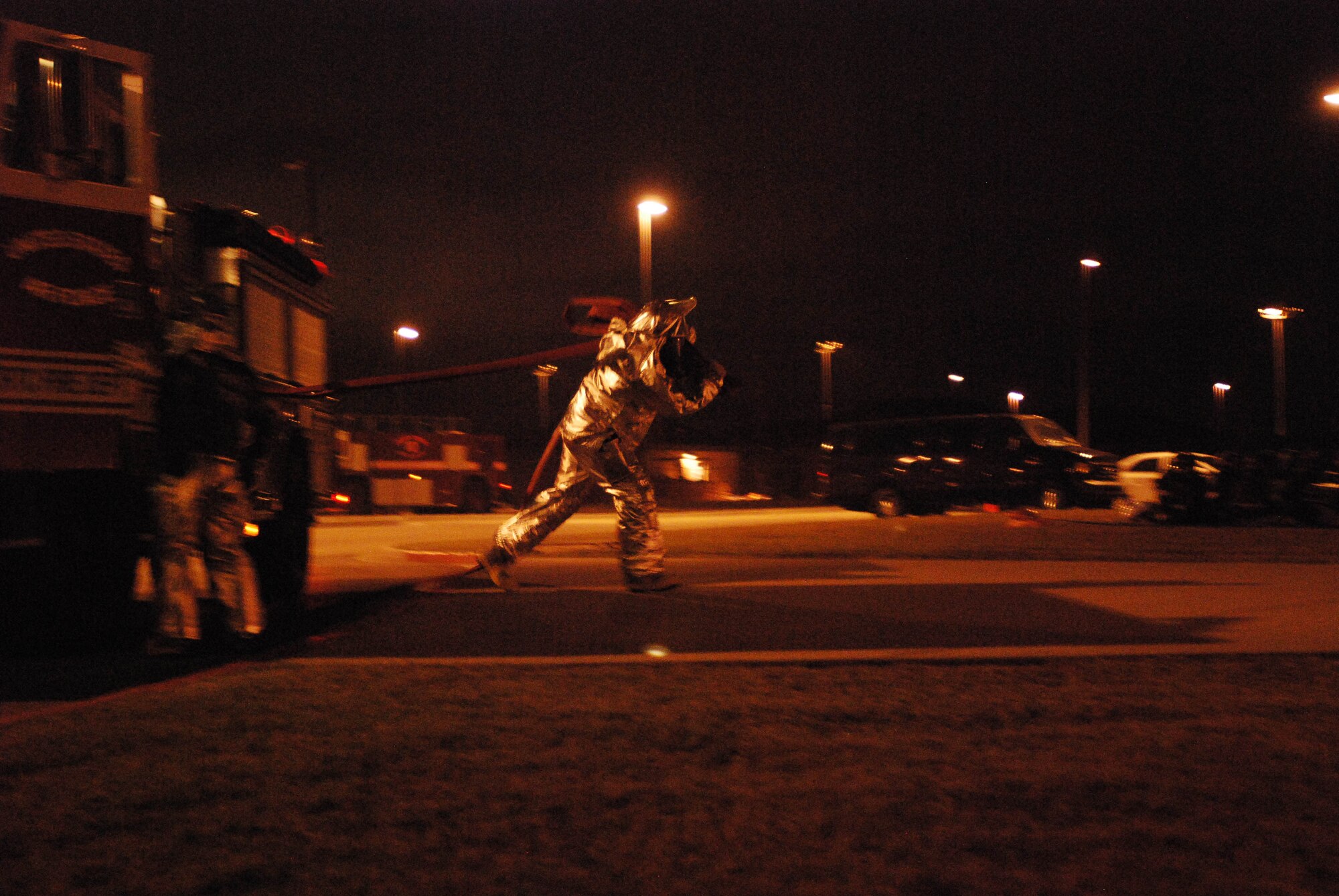 A military fireman responds to a building-on-fire scenario as part of a three-wing Operational Readiness Exercise Oct. 18 held at the Combined Readiness Training Center, Gulfport, Miss. The 403rd Wing, along with the 433rd Airlift Wing and 165th AW, participated in the five-day exercise that tested airmen on various military scenarios. The ORE is the precursor to the Wings' Operational Readiness Inspection in early 2012. (U.S. Air Force photo by Senior Airman Brian McGloin)