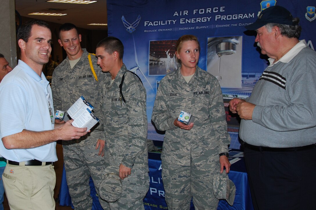 Mr. Edward Jordan, Base Energy Manager, and Mr. Glynn Batla, Resource Efficiency Manager, talk to a group of Sheppard Airmen about energy savings through the use of Compact Fluorescent Light bulbs Oct. 25. The 82nd Civil Engineering Squadron plans to distribute over 1,000 CFL bulbs to replace incandescent bulbs in housing and dormitories on base, a switch that will buy 75 percent energy savings. 