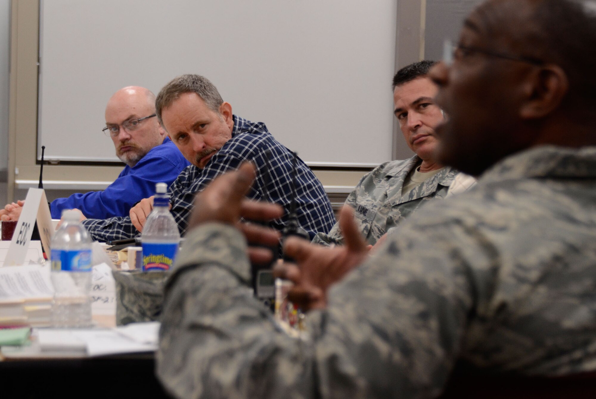 Col. Marshall S. Irvin Jr., 94th Mission Support Group commander stresses points of interest during discussions at an active shooter exercise held here Oct. 25. (U.S. Air Force photo/Don Peek)