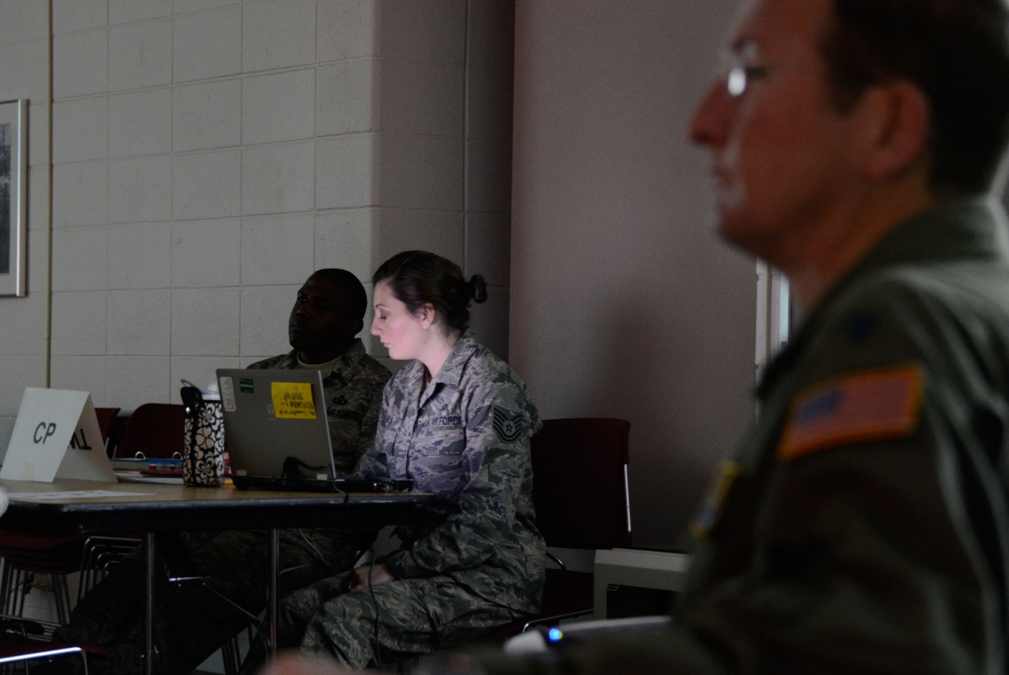 Members of the 94th Airlift Wing conducted an active shooter table-top exercise scenario simulating a terrorist attack on Dobbins Oct. 25.  (U.S. Air Force photo/Don Peek)