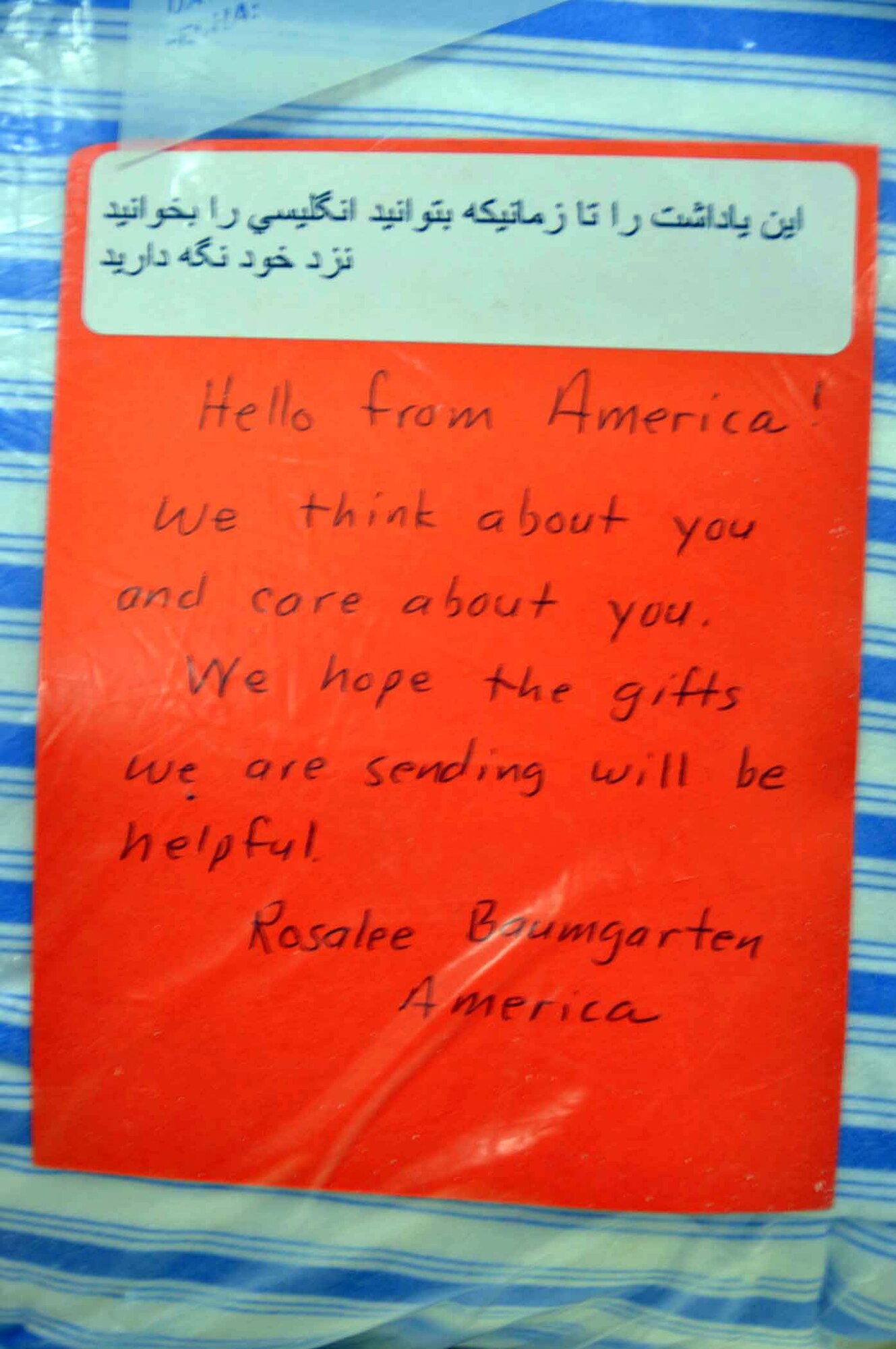 Women of Faith in Redlands donates birthing kits to women in Afghanistan that supplies the recipient with critical supplies for them and their newborn to use during and after childbirth.  Each kit contains this card that tells Afghan women, in their own language at the top, to save the card until they are able to read it or have it read to them by their children.  (U.S. Air Force photo/Master Sgt. Linda Welz)
