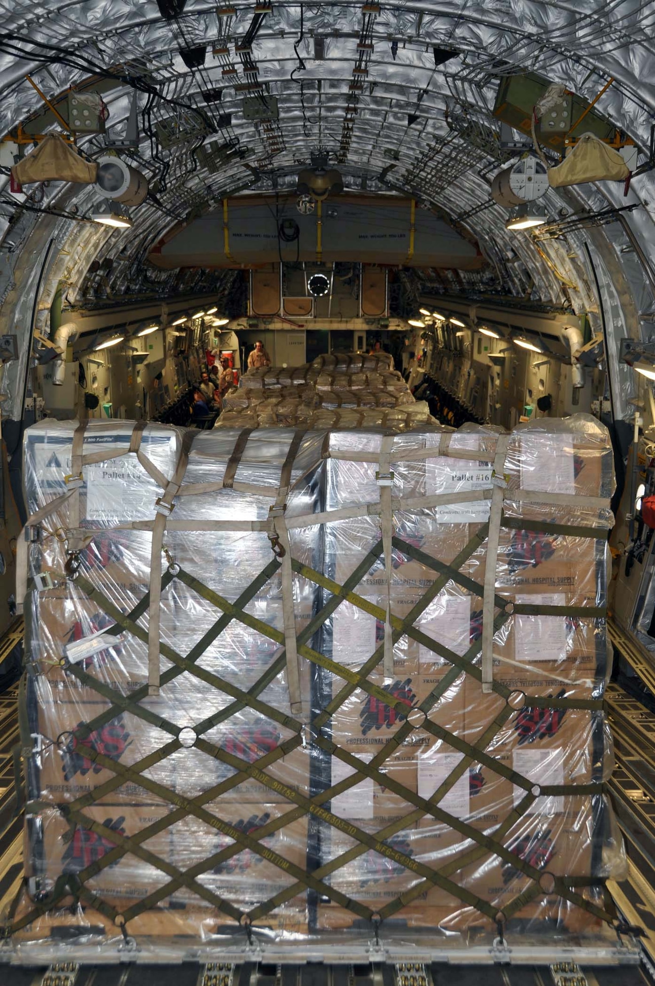 Humanitarian cargo is secure on a C-17 Globemaster III after its departure from March Air Reserve Base, Calif., October 2, 2011, enroute to Afghanistan.  Team March transported the cargo, donated by Women of Faith in Redlands, Calif., to Kabul through the Denton Amendment program, a U.S. government program that allows humanitarian supplies to be shipped on military aircraft free of charge on a space available basis. (U.S. Air Force photo/Master Sgt. Linda Welz)