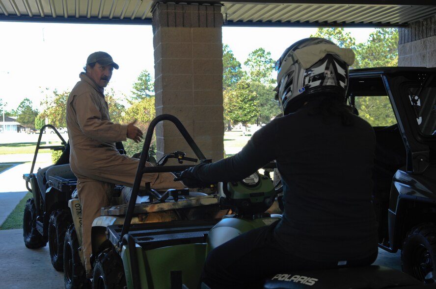 Tony Cuellar, 38th Rescue Squadron vehicle manager, gives Airmen from the squadron’s aircrew flight equipment section reminders on how to operate a four-wheeler Oct. 21, 2011, at Moody Air Force Base, Ga. They get qualified when they first arrive on station and complete refresher training as needed. (U.S. Air Force photo by Senior Airman Brigitte N. Brantley/Released)