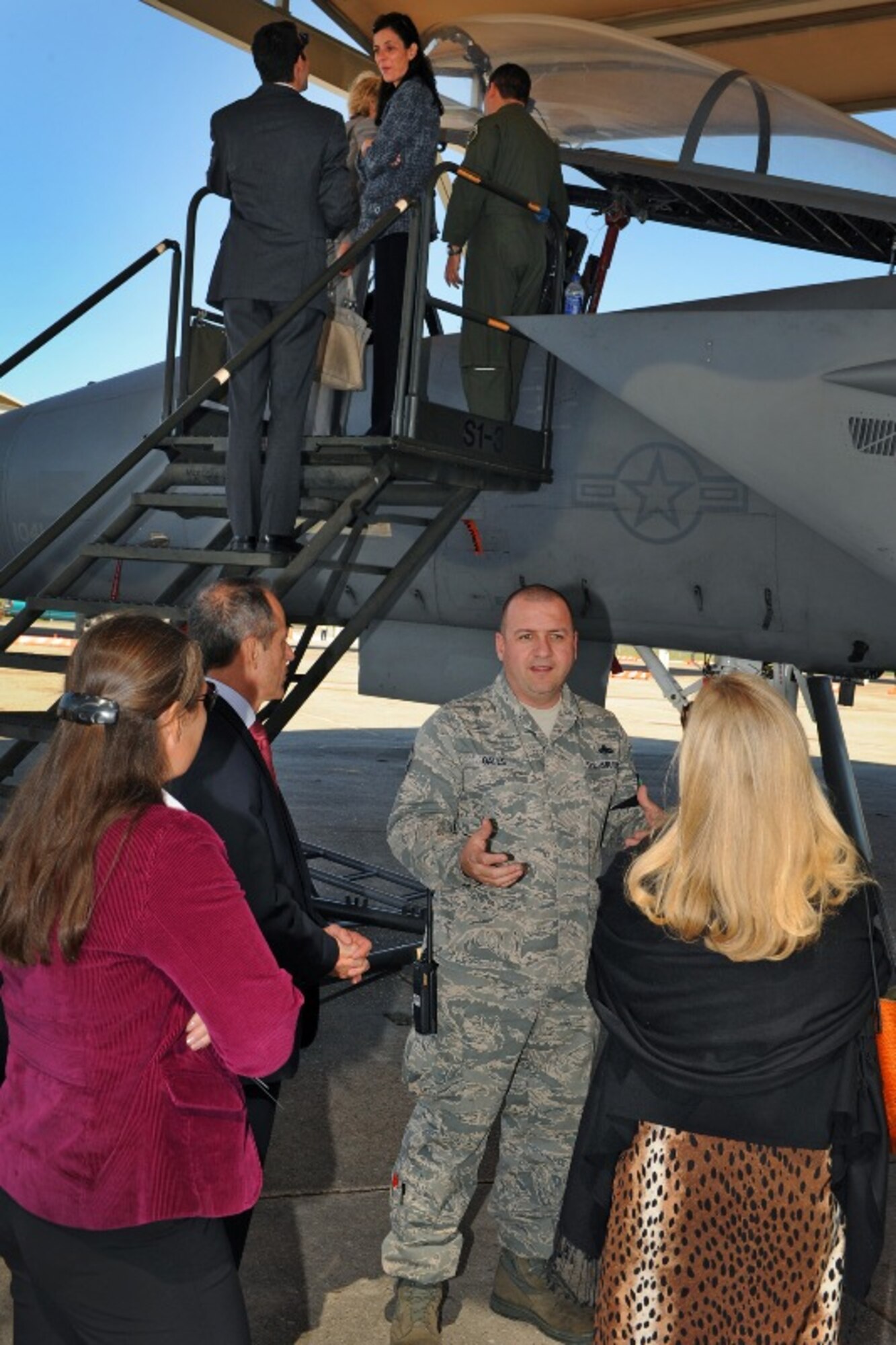 BELLE CHASSE, La. - Master Sgt. Thomas Gates explains his role as a Maintenance Squadron member in the 159th Fighter Wing, Louisiana Air National Guard, to foreign ambassadors with the Experience America program at NAS-JRB New Orleans, La., Oct. 21, 2011.  On the last day of a three-day tour, the ambassadors were given a tour of the 159th Fighter Wing's F-15 Eagle fighter aircraft.  (U.S. Air Force photo by Master Sgt. Dan Farrell, 159th Fighter Wing Public Affairs Office/Released)