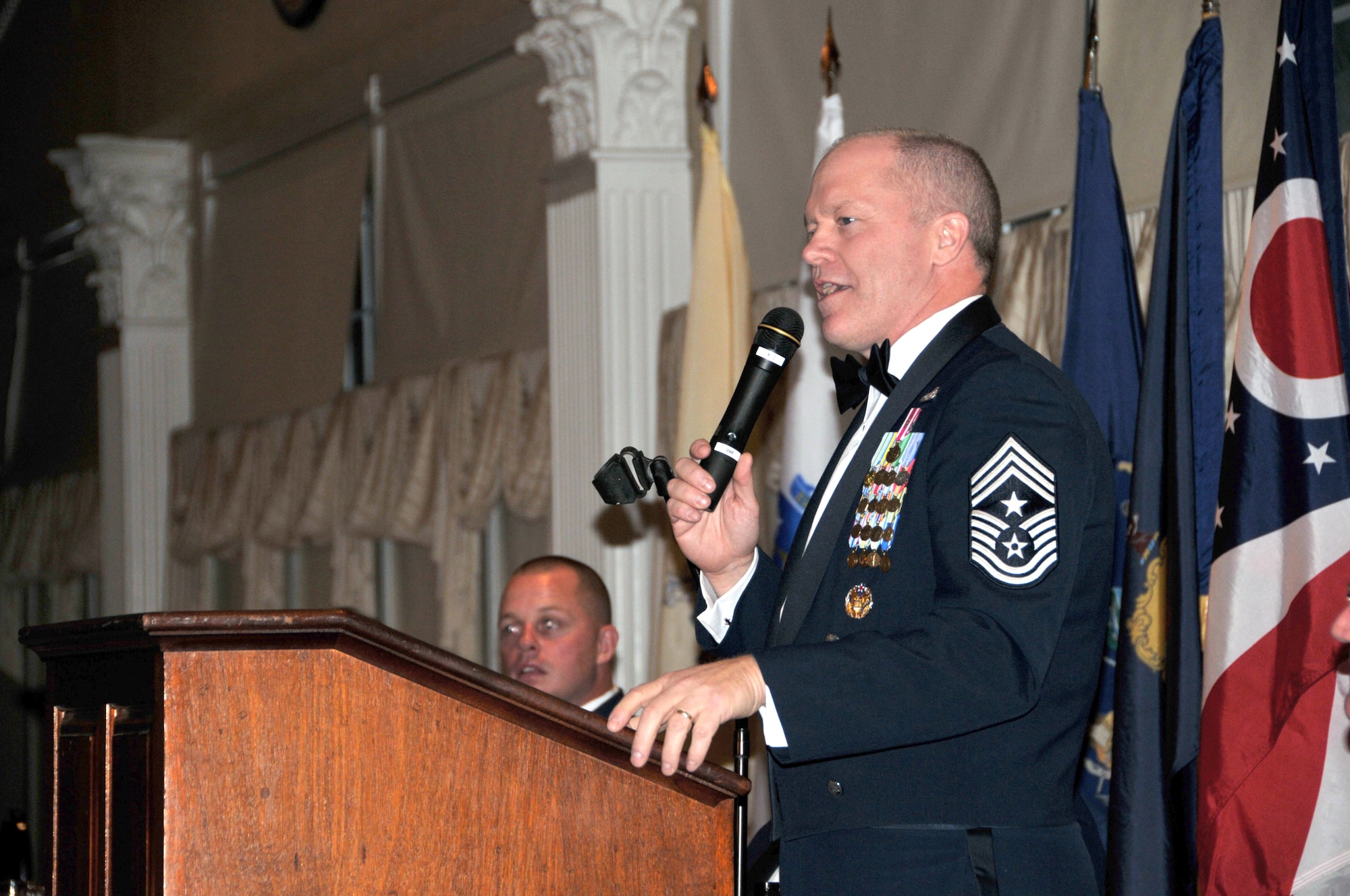 Command Chief Master Sgt. Christopher E. Muncy, tenth command chief master sergeant to the director of the Air National Guard Bureau, speaks to senior enlisted at the annual Senior Non-commissioned Officer/Chief Petty Officer Formal Dining-in, now in its 30th year. The event was held at the Aqua Turf in Plantsville, Conn. Oct. 6, 2011. (U.S. Air Force photo by Tech. Sgt. Joshua Mead)