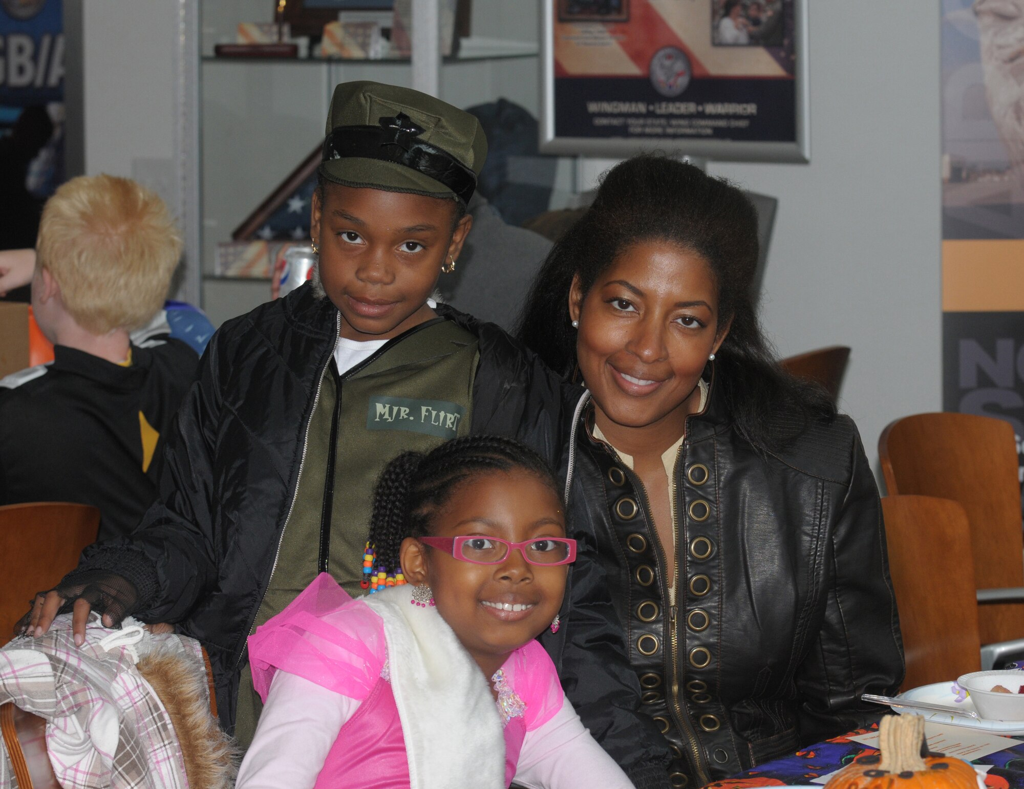 Tajai Black, Angela Pettis and  Drew Pettis, the family of Mr. Drew Pettis, A1, participated in Halloween festivities on October 22, 2011 at the Air National Guard Readiness Center, Joint Base Andrews, MD. (U.S. Air Force photo by Staff Sergeant Lorenzo Parnell) (Released)
