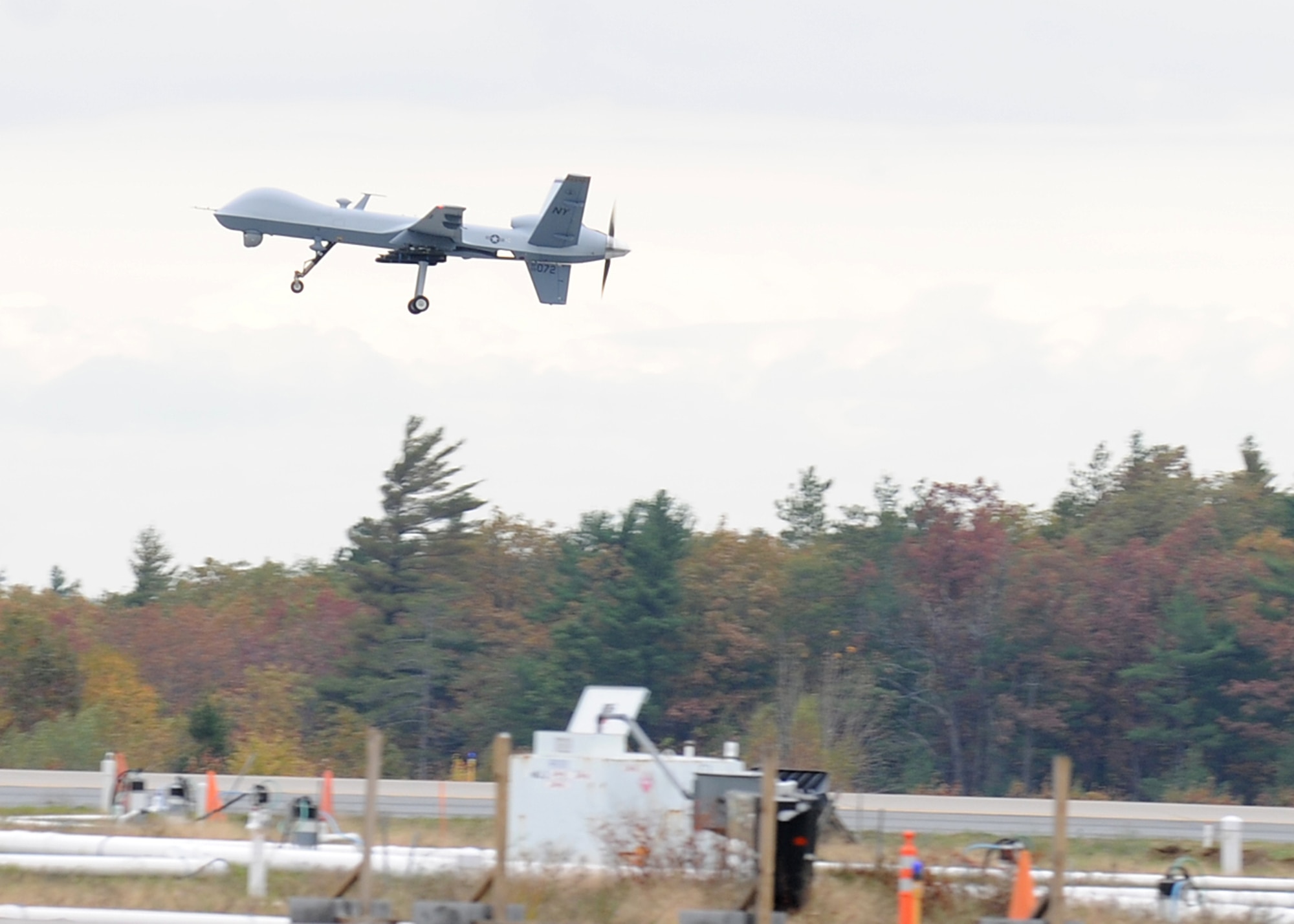 A MQ-9 Reaper assigned to the 174th Fighter Wing, New York Air National Guard, Syracuse takes to the air for the first time on 18 October 2011 at Ft. Drum’s Wheeler-Sack Army Airfield. Working out of its launch and recovery site at Wheeler-Sack, the 174th will fly the remotely piloted aircraft in restricted airspace around Ft. Drum. (US Air Force Photo by Staff Sgt. Ricky Best)