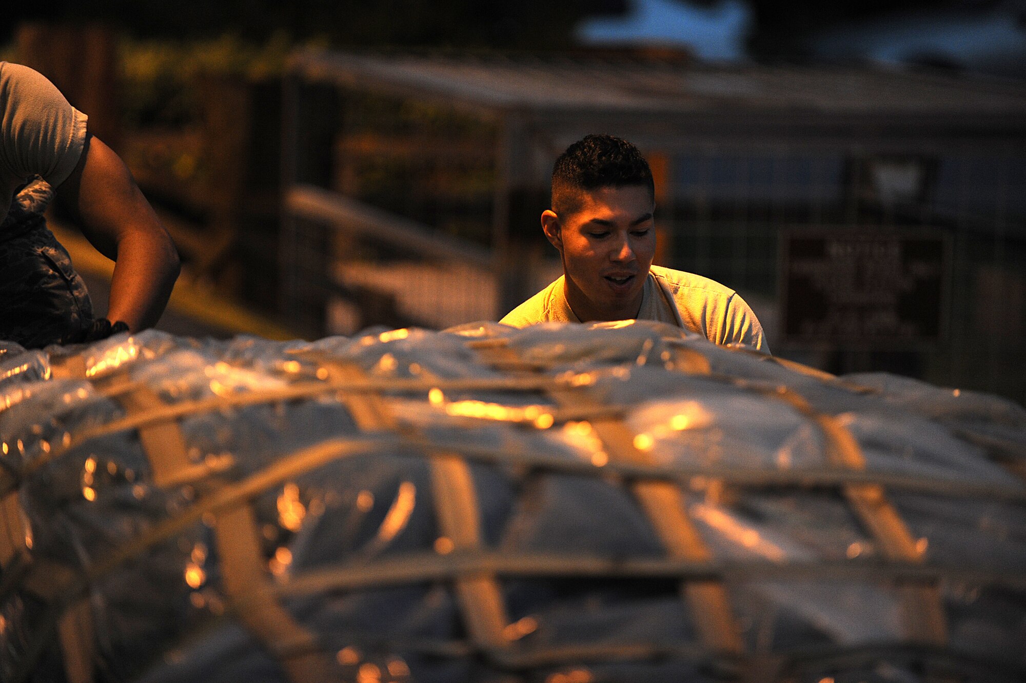 U.S. Air Force Airman Hugo Delgado, 18th Logistics Readiness Squadron rotational Airman, palletizes baggage for simulated deployers during local operational readiness exercise Beverly High 12-1, Oct. 25, on Kadena Air Base, Japan. Beverly High is designed to test the operational readiness of Airmen assigned to Kadena Air Base.
(U.S. Air Force photo/Staff Sgt. Christopher Hummel/released)