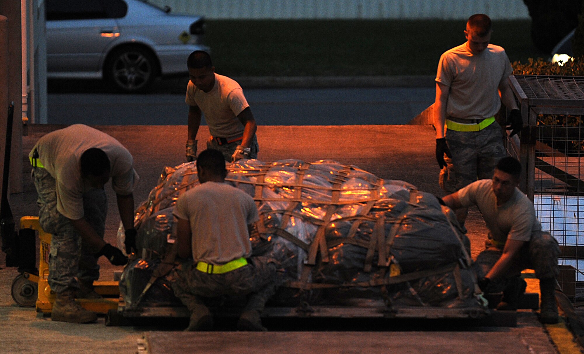 U.S. Air Force Airmen assigned to the 18th Logistics Readiness Squadron palletize baggage for simulated deployers during local operational readiness exercise Beverly High 12-1, Oct. 25, on Kadena Air Base, Japan. Beverly High is designed to test the operational readiness of Airmen assigned to Kadena Air Base.
(U.S. Air Force photo/Staff Sgt. Christopher Hummel)