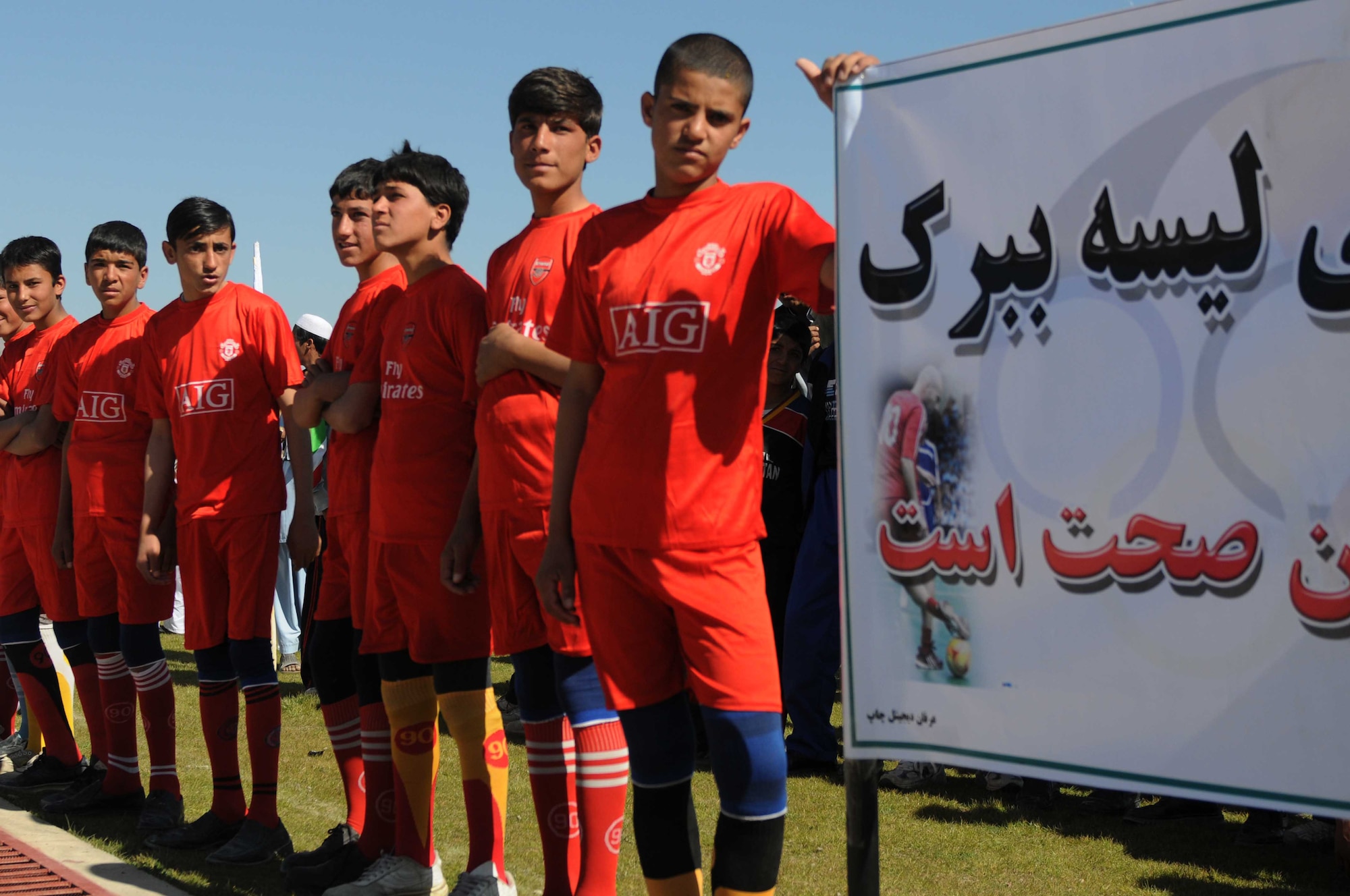 Afghan soccer teams celebrate the opening of a new provincial sports complex in Paktya Province, Afghanistan, Oct 19, 2011. More than 1,500 guests attended the ceremony, recognizing several recently-completed development projects in the province. (U.S. Air Force photo/1st Lt. Cammie Quinn)