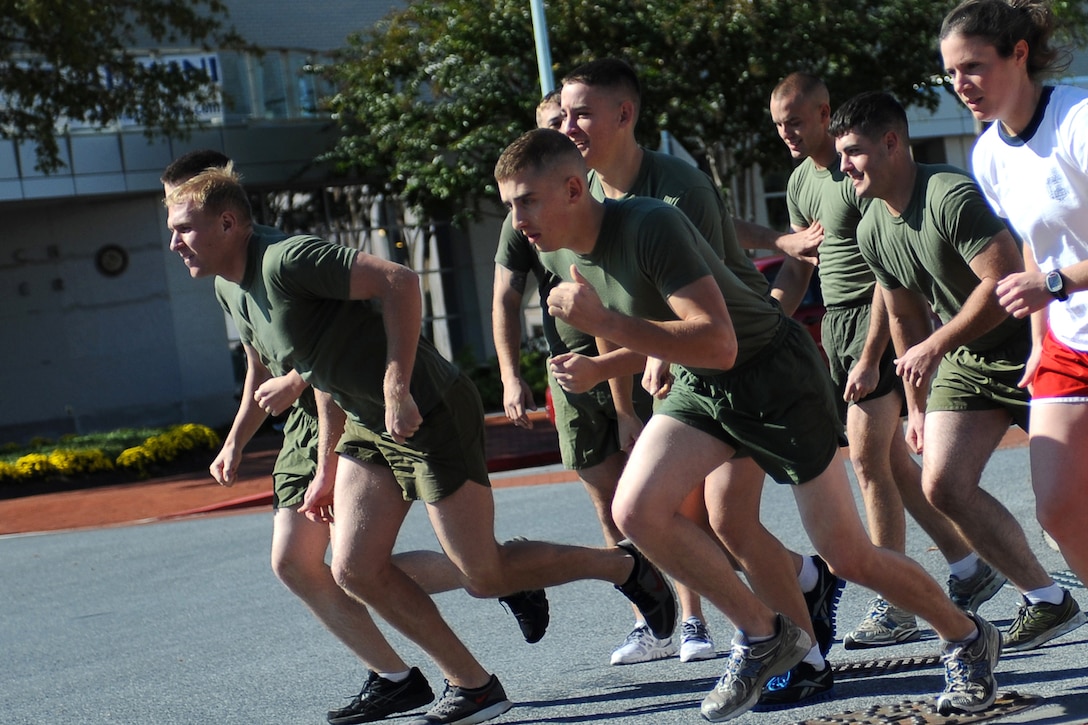 Marine Barracks Washington Marines start the running portion of the Raging Rhino competition at the United States Naval Academy, Annapolis, Md., Oct. 25. The Raging Rhino was the 13th event in the Barracks' 17-event 2011 Commander's Cup series. Marines were timed in running two miles, swimming 300 meters, running one more mile and finishing the race with a 150 meter swim. (Official Marine Corps Photo by Lance Cpl. Mondo Lescaud)