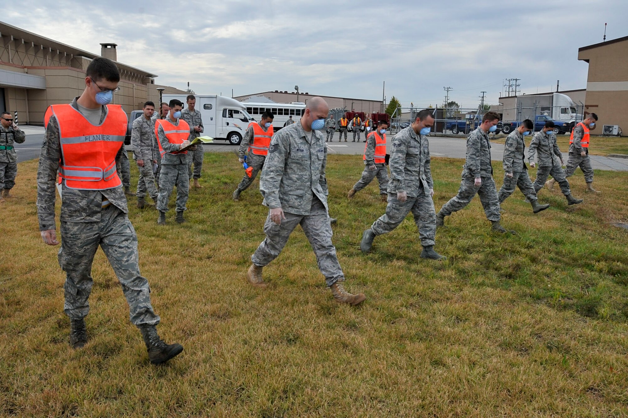 Members from the 51st Force Support Squadron perform search and recovery sweep during the Emergency Management Exercise Oct. 21, 2011. The EME tested the preparedness of Osan responders as they were evaluated on four major areas which are notification, response, withdrawal and recovery. The EME was an overall success for members of team Osan with an overall rating of excellent. (U.S. Air Force photo/Senior Airman Adam Grant)