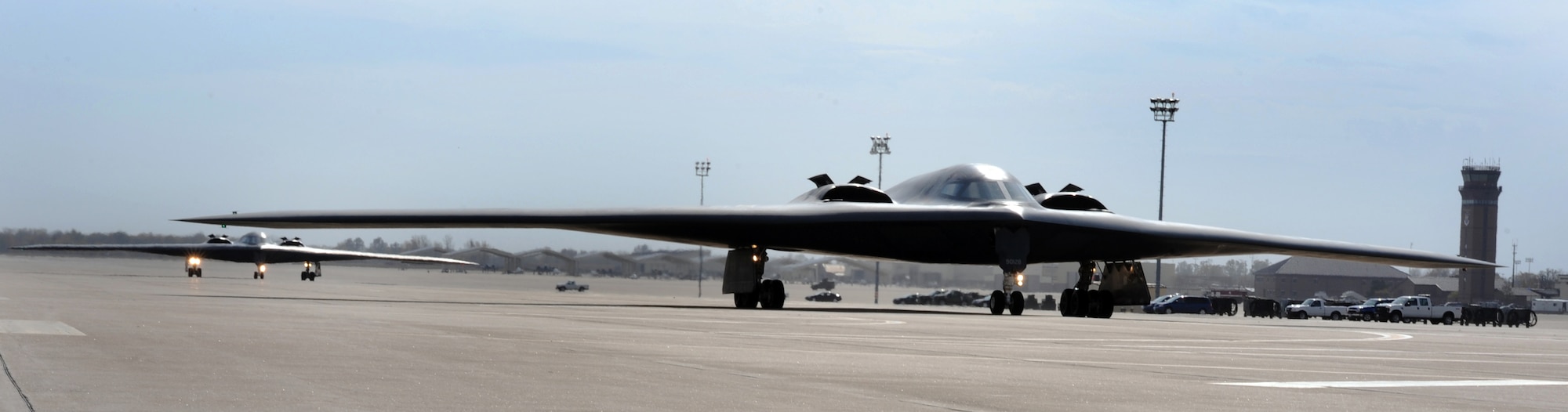 WHITEMAN AIR FORCE BASE, Mo--B-2 Stealth Bombers taxi down the runway after responding to a rapid launch portion of Global Thunder 12 exercise Oct. 25.  The exercise provides unique training opportunities for component, task force, unit forces, and command posts to deter, and if necessary defeat a military attack against the United States and to employ forces as directed by the president. (U.S. Air Force photo/Senior Airman Laura Goodgame) 
