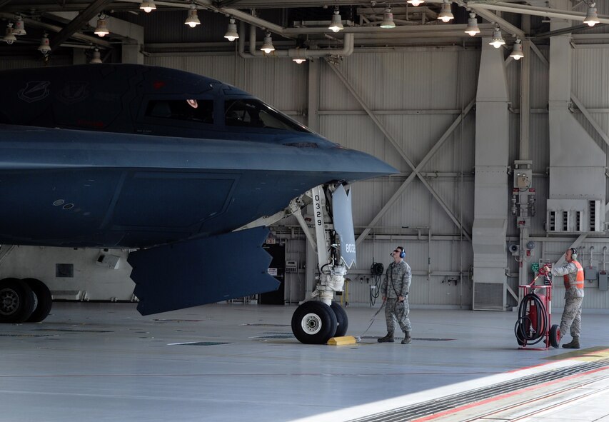 WHITEMAN AIR FORCE BASE, Mo -- 509th Aircraft Maintenance Squadron, maintainers and crew chiefs, prepare B-2 Stealth Bombers for Global Thunder 12 exercise Oct. 25.  The exercise provides unique training opportunities for component, task force, unit forces, and command posts to deter, and if necessary defeat a military attack against the United States and to employ forces as directed by the president. (U.S. Air Force photo/Senior Airman Laura Goodgame) 