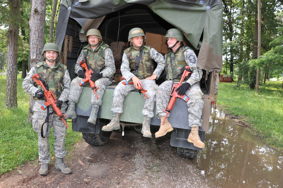 As part of recurring combat skills training, 932nd civil engineers worked on a simulated driving route through the woods and mud.   The training was held during a recent unit training assembly, and  included convoy operations, low-crawl maneuvers, weapons, and perimeter security.  (U.S. Air Force photo/Tech. Sgt. Chris Parr)
