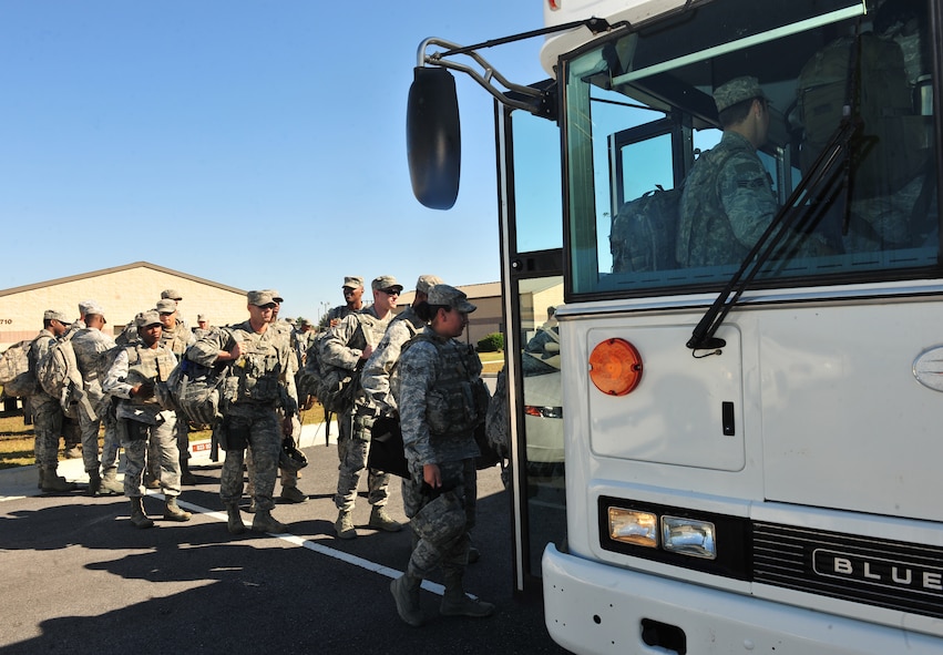 Airmen with the 823rd Base Defense Squadron board a bus to the armory at Moody Air Force Base, Ga., Oct. 23, 2011. The 823rd BDS is currently on a 10-day training mission with the 105th Security Forces Squadron Air National Guard at Camp Smith, N.Y. In August 2009, it was announced that Airmen from the 105th SFS from Stewart Air National Guard Base, N.Y., would support the 820th Base Defense Group with manpower during deployments. Since then, Airmen from both units have integrated with each other for training. (U.S. Air Force photo by Senior Airman Stephanie Mancha/Released)