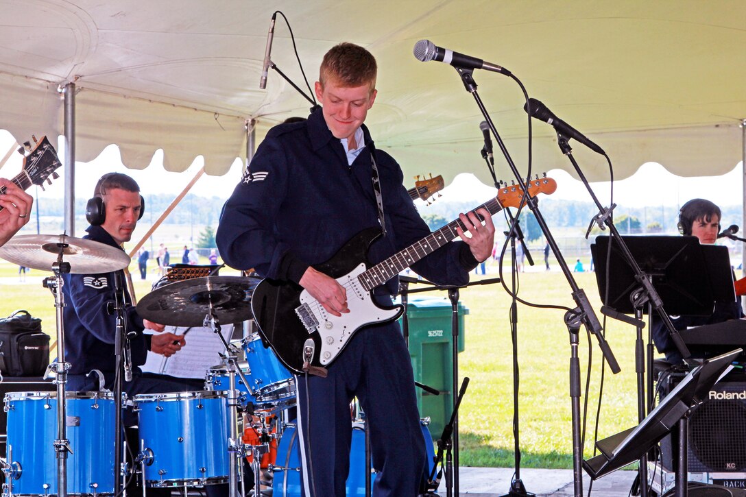 Senior Airman Rogan Allen performs with Systems Go.