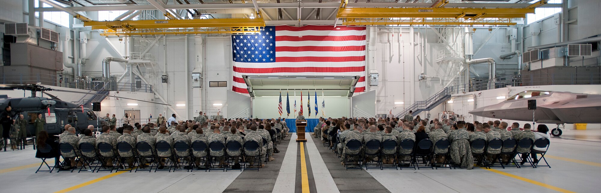 The 18th Chairman of the Joint Chiefs of Staff General Martin Dempsey addresses Soldiers, Airmen, Sailors, Marines and civilians at a town hall meeting in hanger 20 on Joint Base Elmendorf-Richardson, Alaska, Oct. 25, 2011. More than 600 military and civilian members listened to his goals and challenges for the Department of Defense. General Dempsey took question from the audience following his remarks. (U.S. Air Force photo/Staff Sgt. Zachary Wolf)