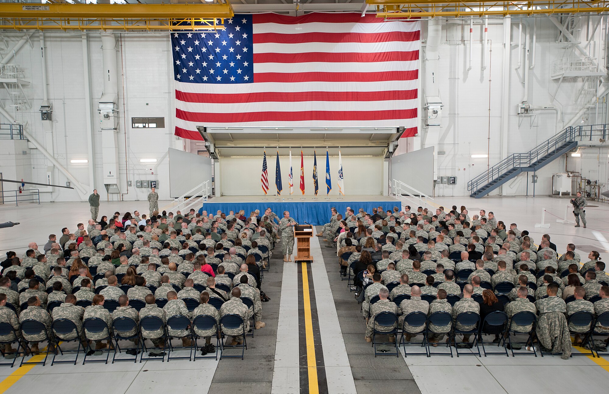 The 18th Chairman of the Joint Chiefs of Staff General Martin Dempsey addresses Soldiers, Airmen, Sailors, Marines and civilians at a town hall meeting in hanger 20 on Joint Base Elmendorf-Richardson, Alaska, Oct. 25, 2011. More than 600 military and civilian members listened to his goals and challenges for the Department of Defense. General Dempsey took question from the audience following his remarks. (U.S. Air Force photo/Senior Airman Cynthia Spalding)