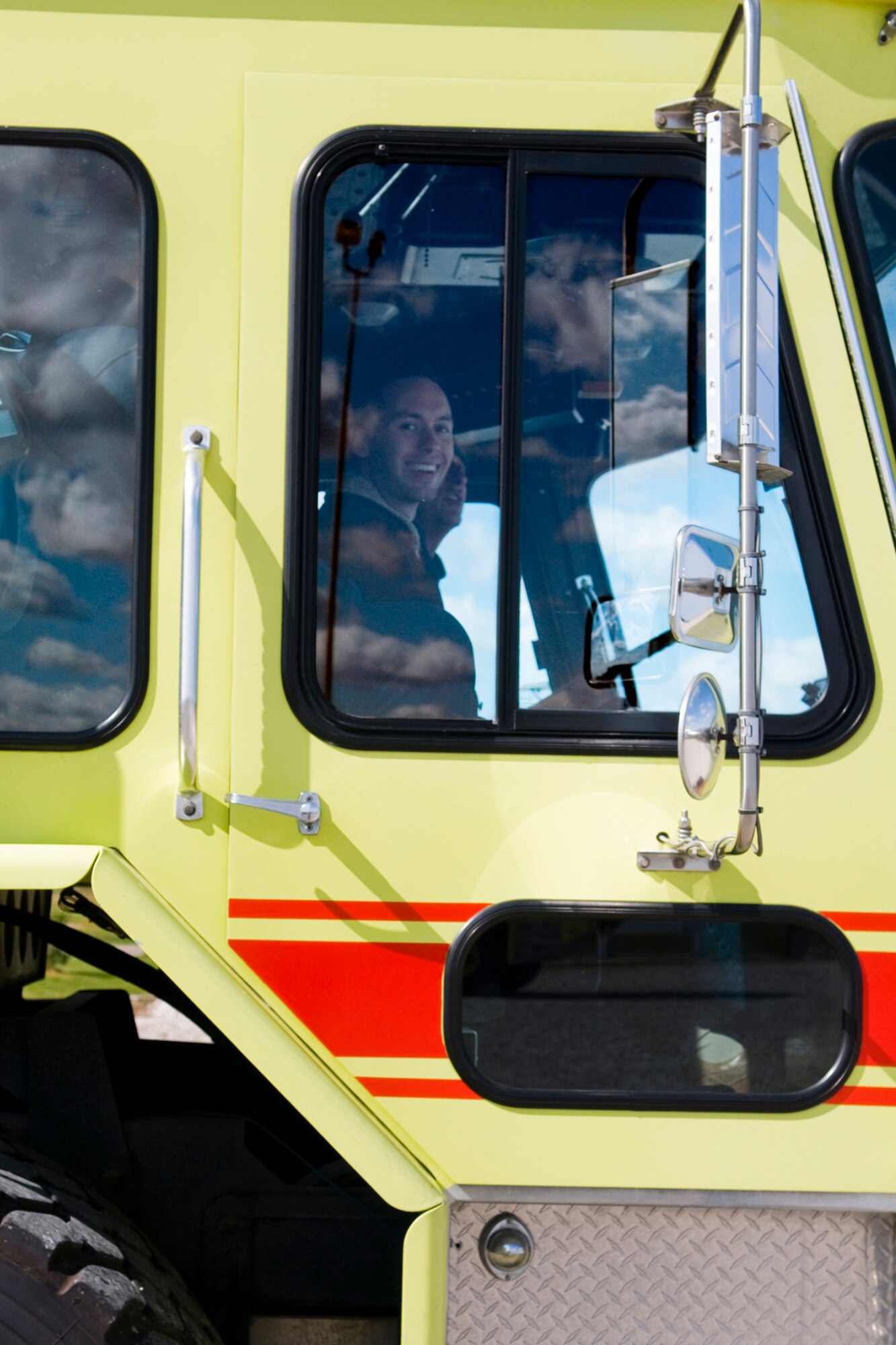 GRISSOM AIR RESERVE BASE, Ind. -- Rocky Walls, 434th Mission Support Group honorary commander, is all smiles inside of a Grissom Fire Department fire truck Oct. 14. He, along with Grissom's other honorary commanders, visited the base to learn more about the 434th MSG. The honorary commander program at Grissom is just one of several community outreach programs aimed at educating the public about Grissom's mission and impact on the community.  (U.S. Air Force photo/Senior Airman Jami K. Lancette)    
